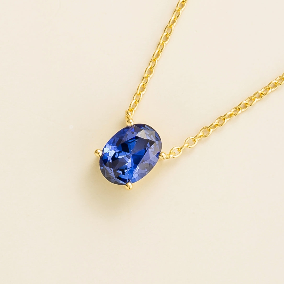 Ovo Blue Sapphire Oval Solitaire Pendant Necklace in Gold