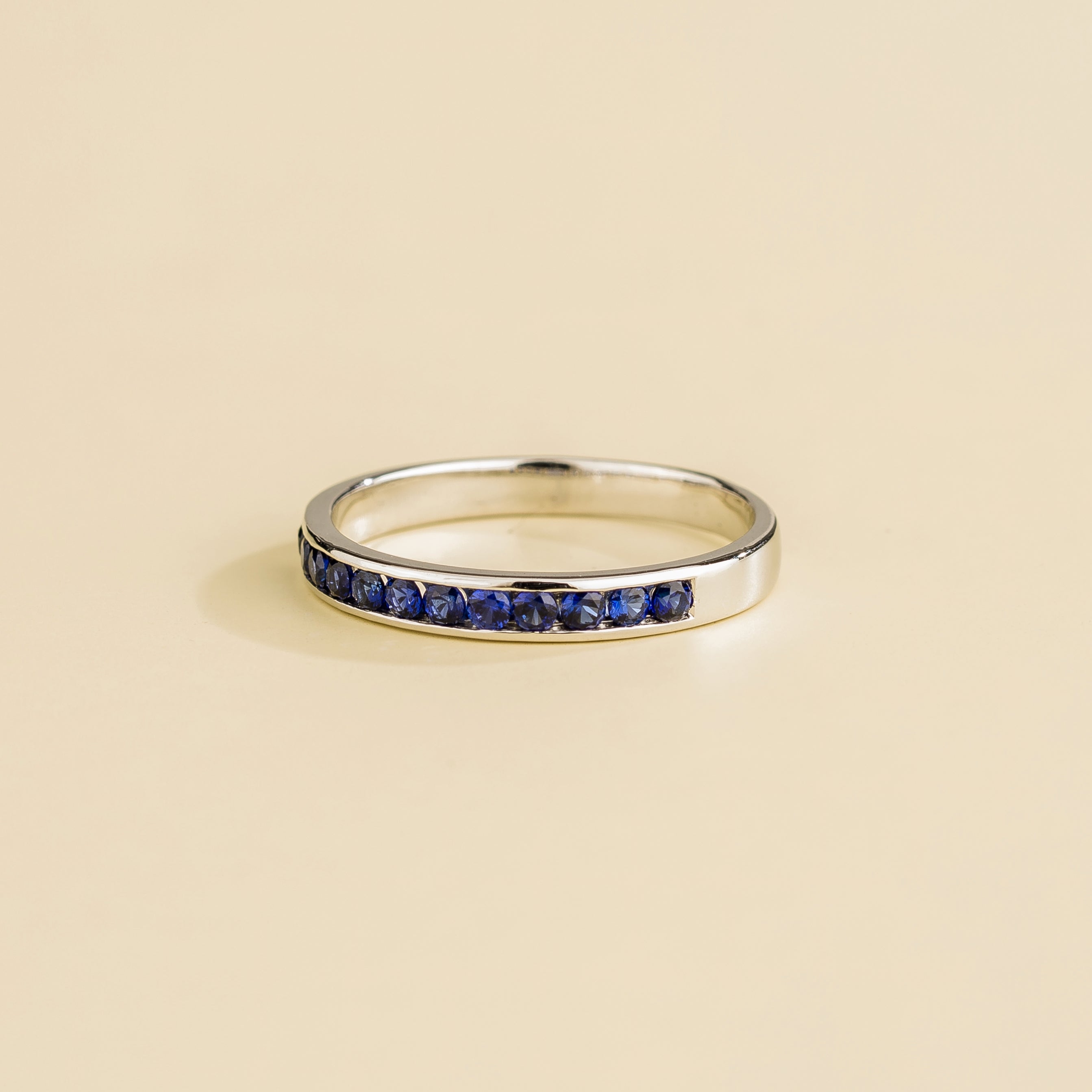 Margo Blue Sapphire Channel Band Ring in White Gold