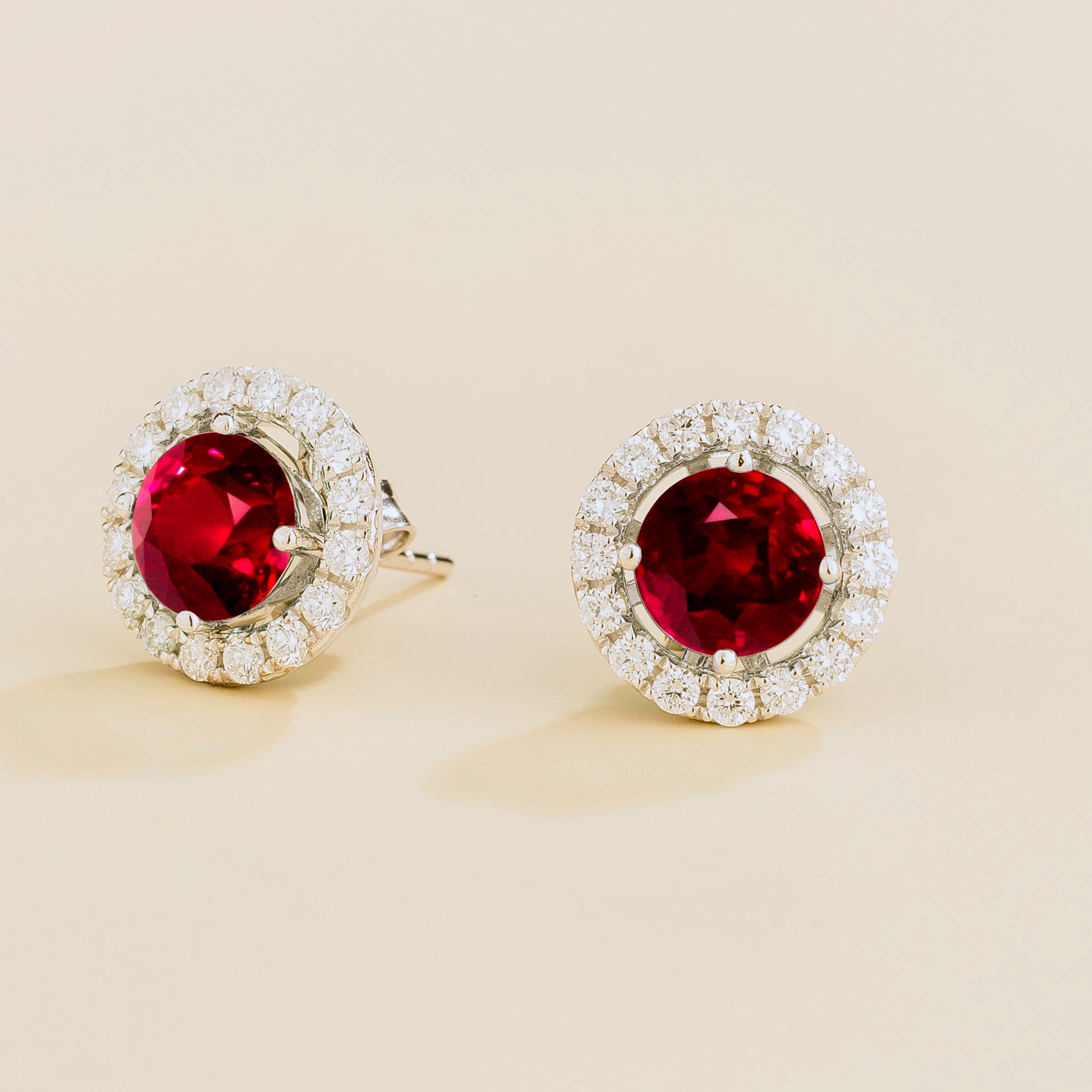 Floret Ruby Round & Diamond Halo Stud Earrings in White Gold