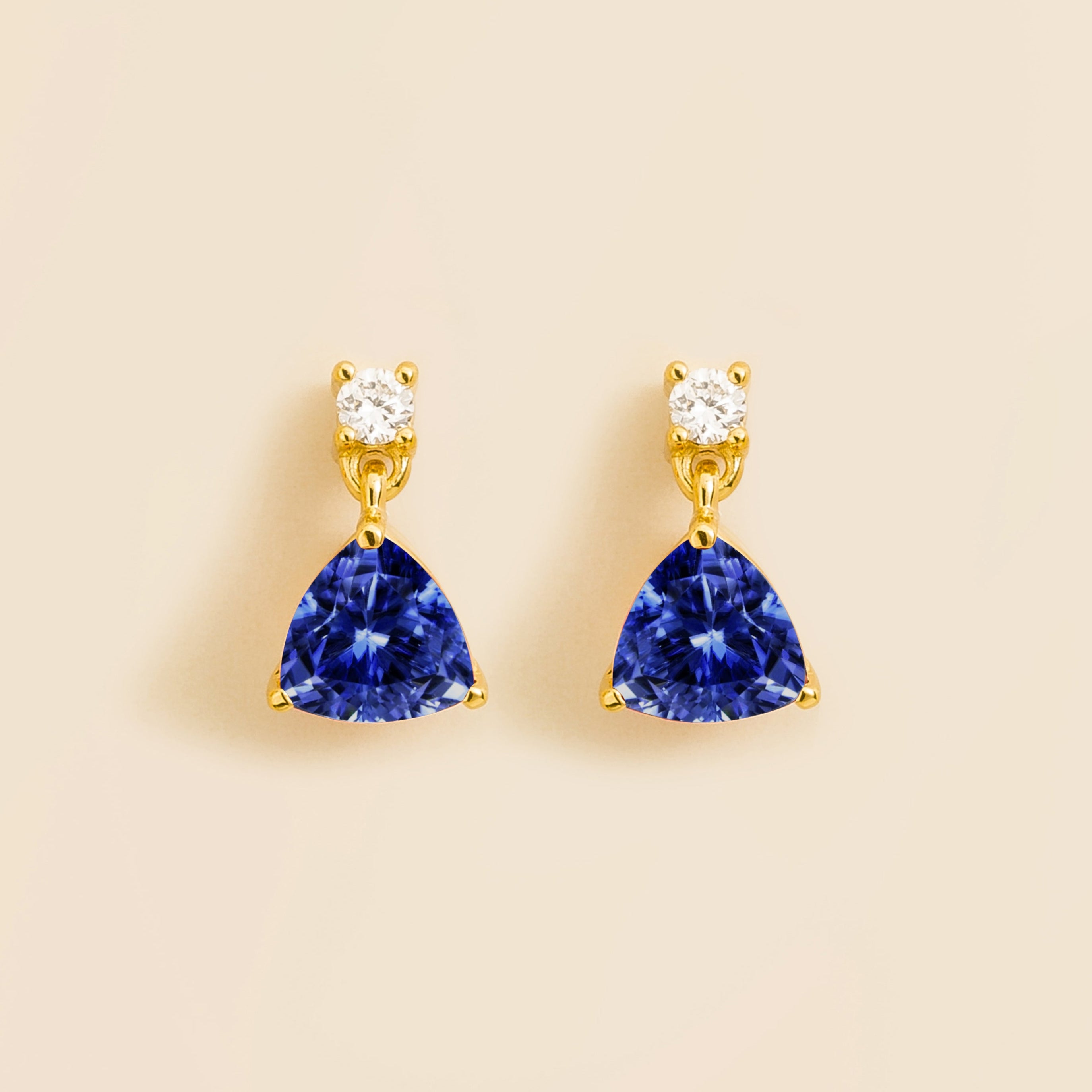 drop earrings set with blue sapphire and diamonds