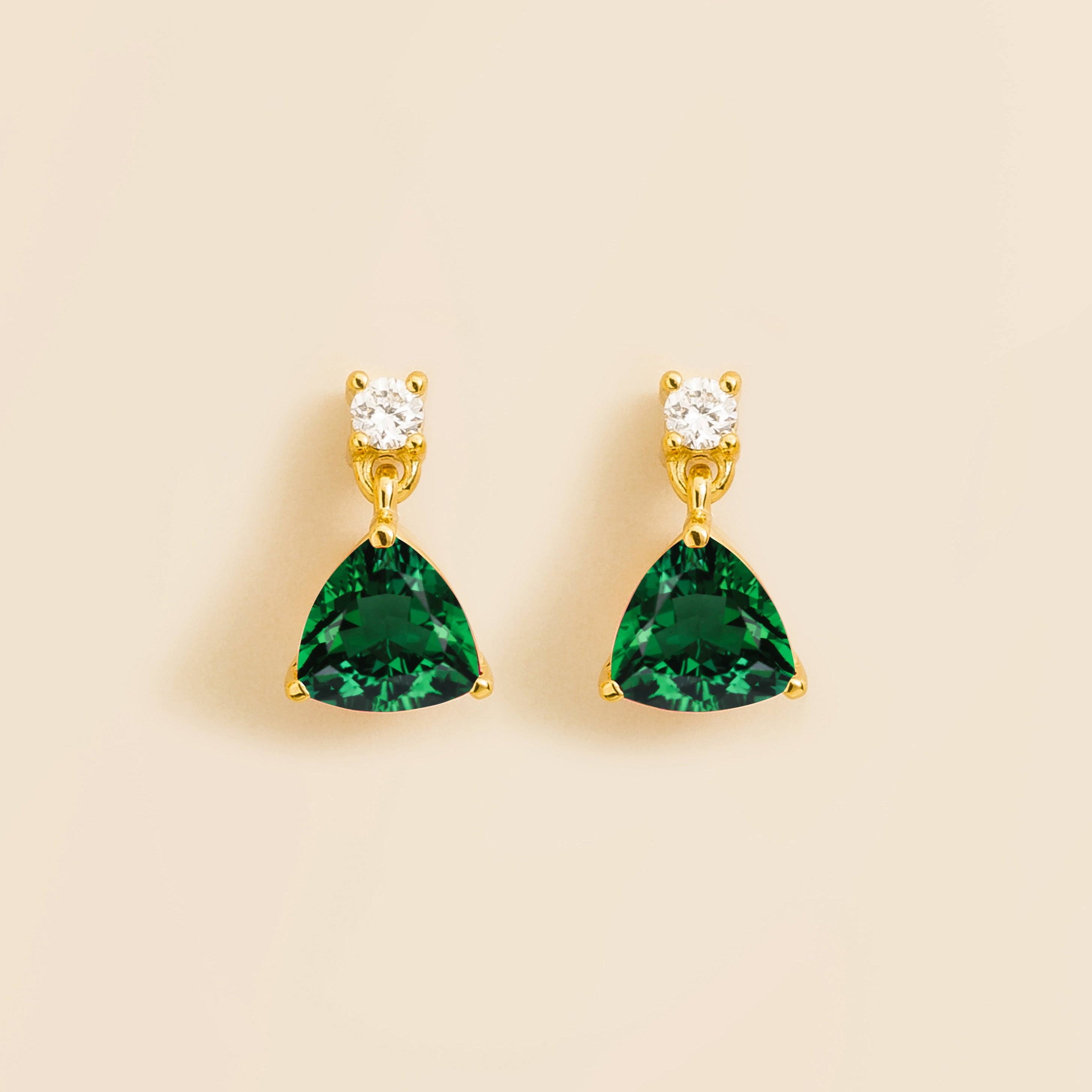 drop earrings set with emerald and diamonds