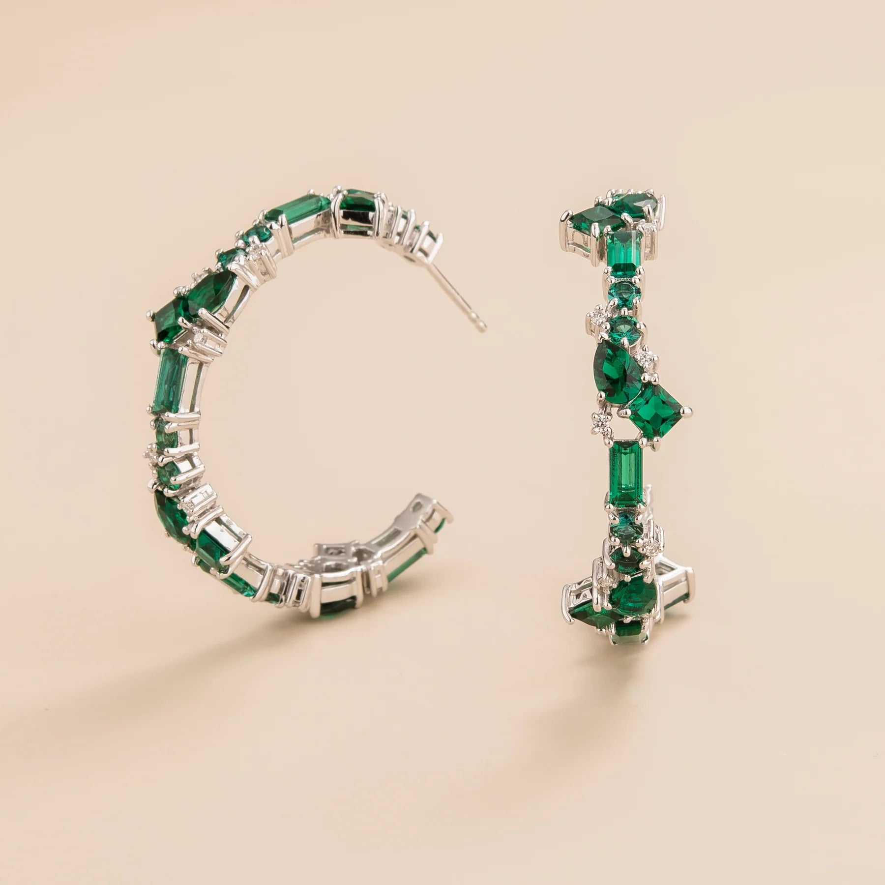 Lanna large hoop earrings in 18K white gold vermeil set with lab grown emerald and diamond gem stones. Perfect for yourself and as gift.