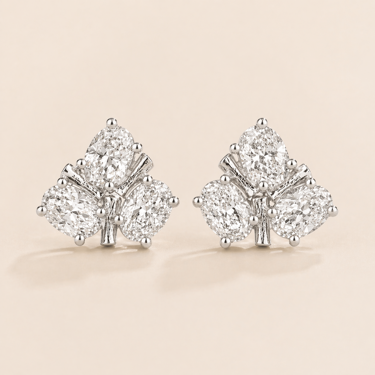 Ligna Oval Diamond Cluster Stud Earrings in White Gold