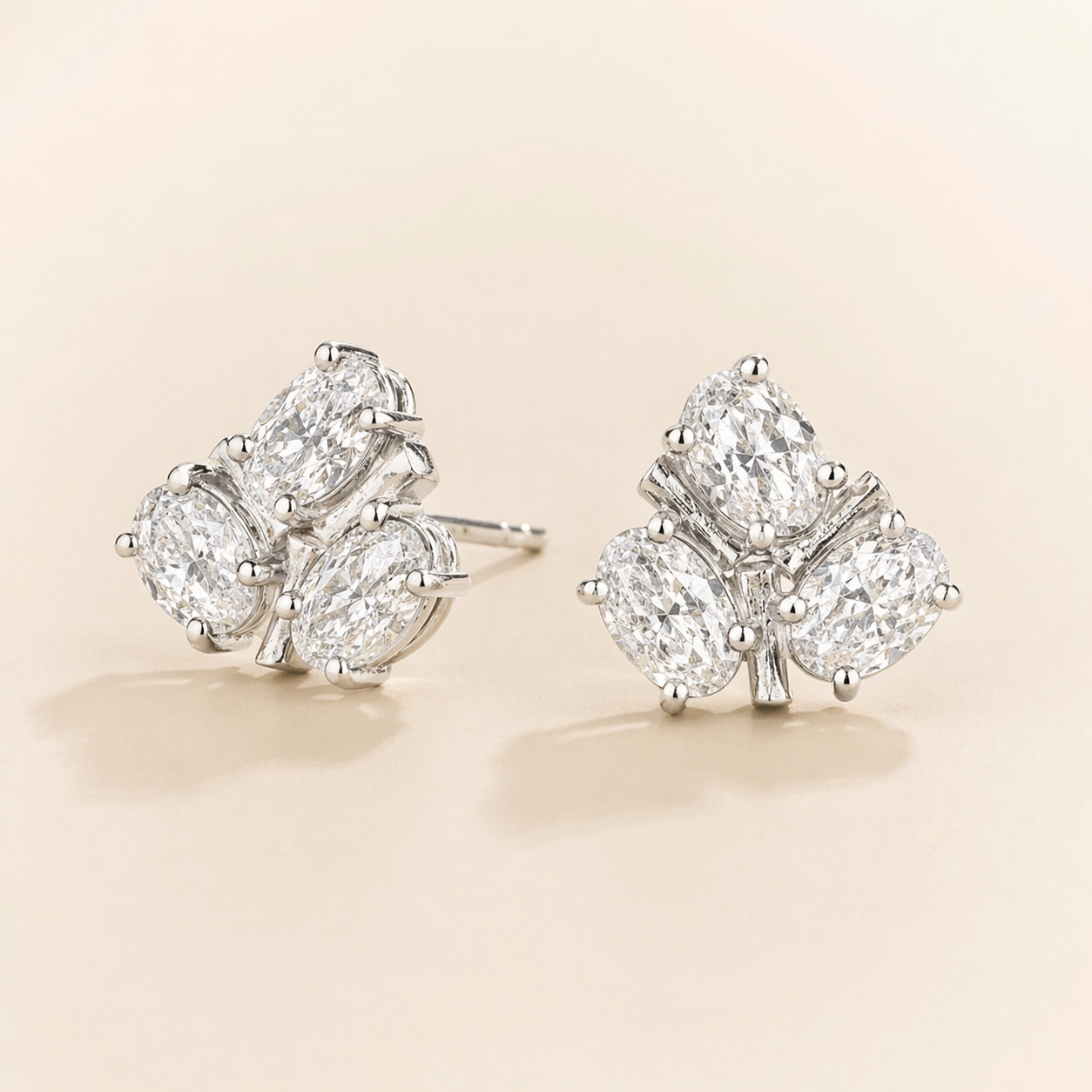 Ligna Oval Diamond Cluster Stud Earrings in White Gold