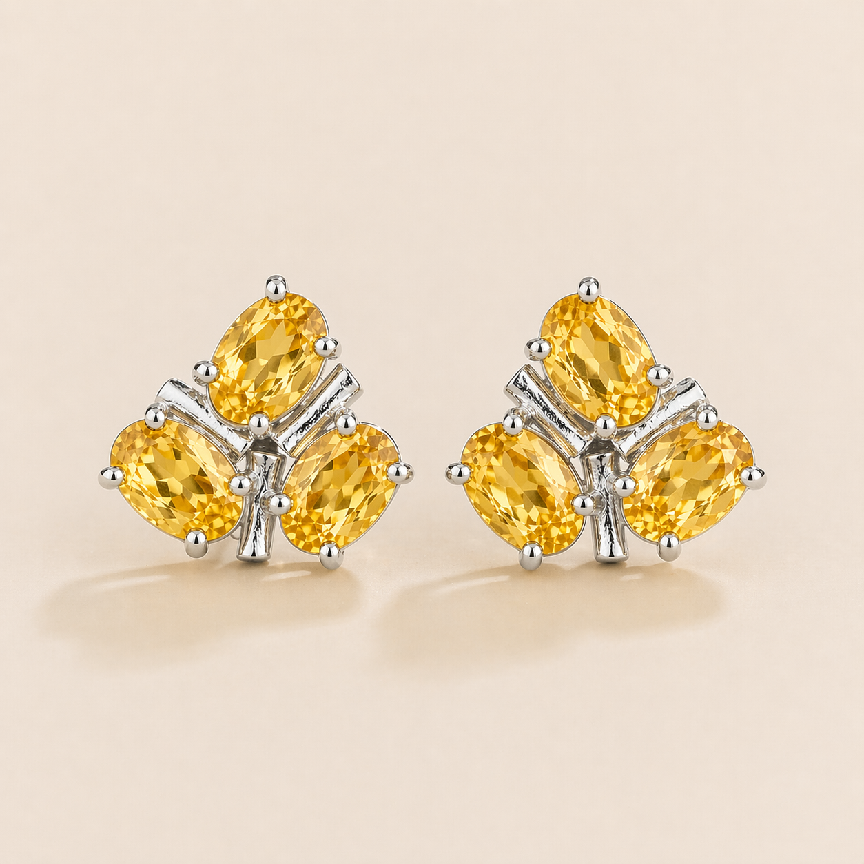 Ligna Oval Yellow Sapphire Cluster Stud Earrings in White Gold