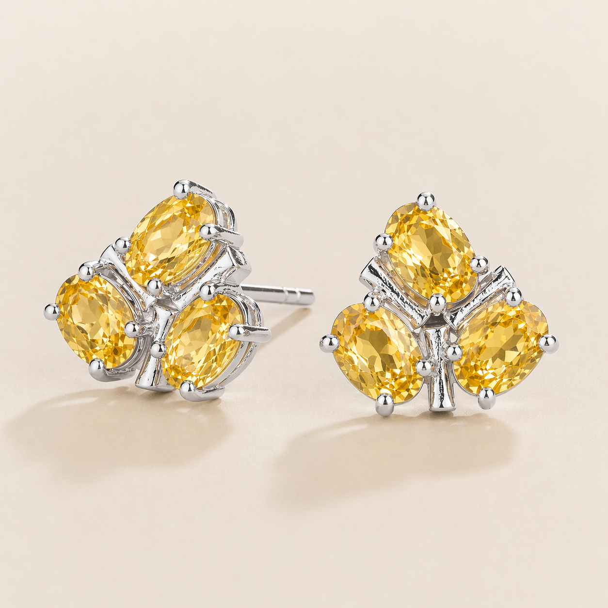 Ligna Oval Yellow Sapphire Cluster Stud Earrings in White Gold