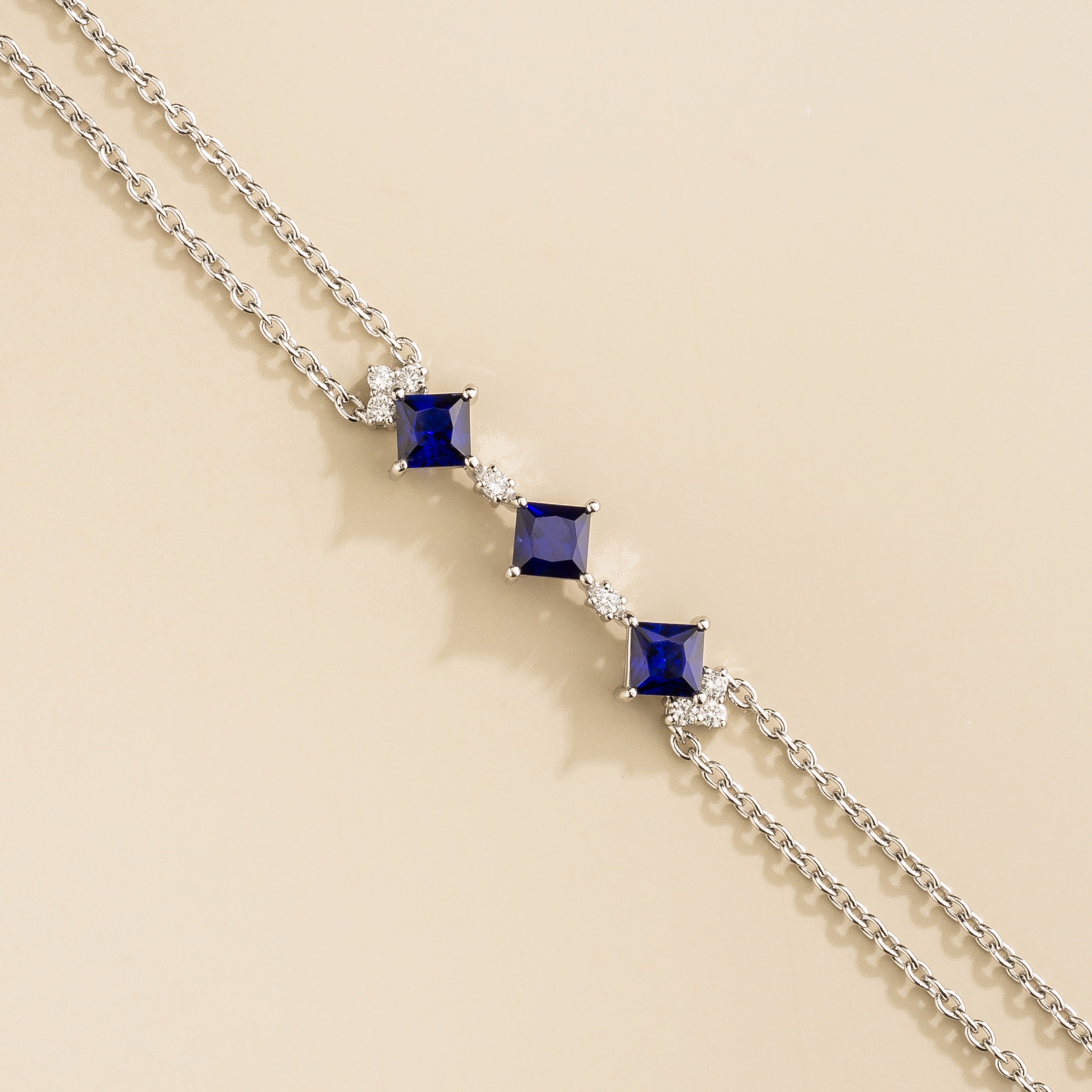 luxury bracelet set with blue sapphires and diamonds in white gold