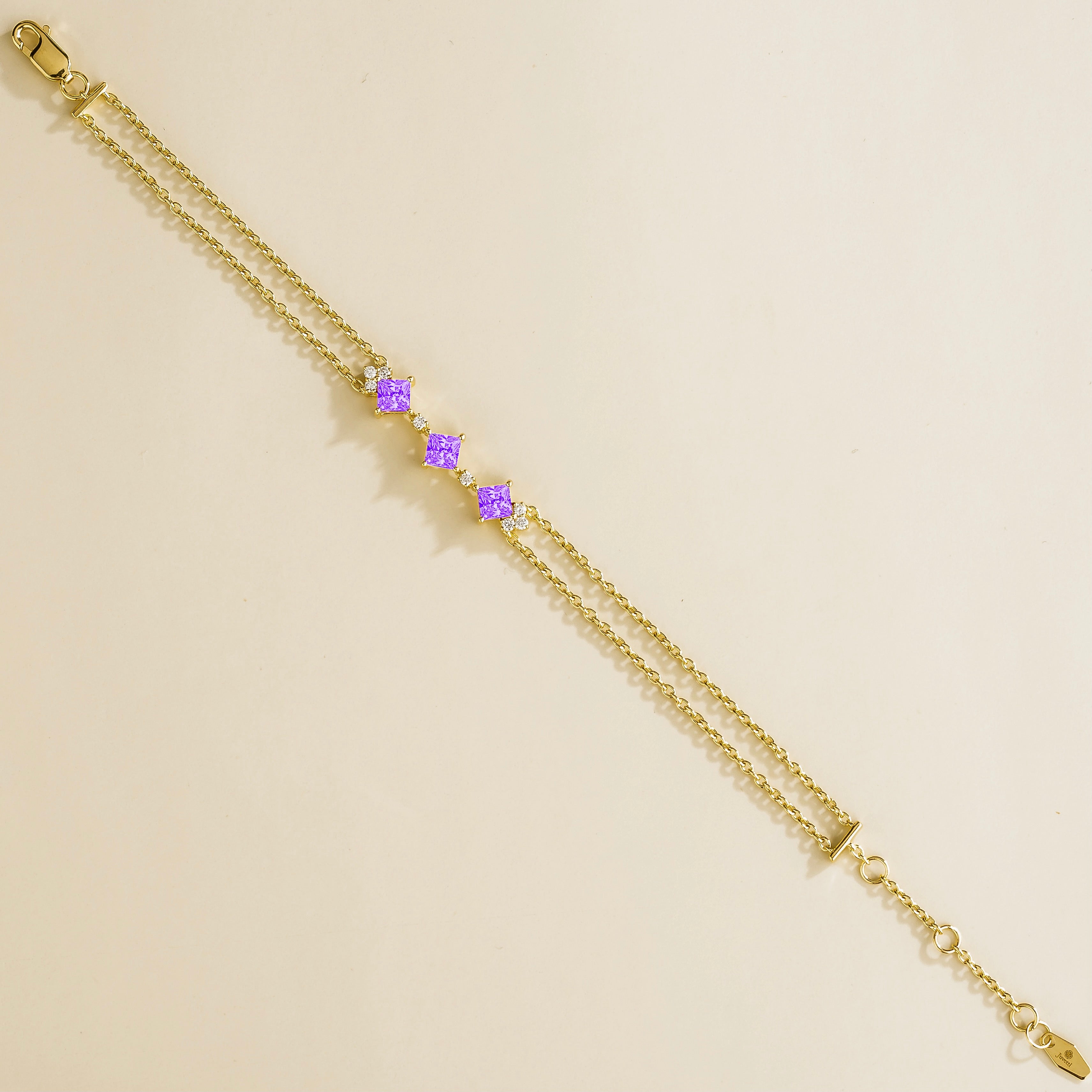 elegant gold bracelet with purple sapphires and lab grown diamonds for women