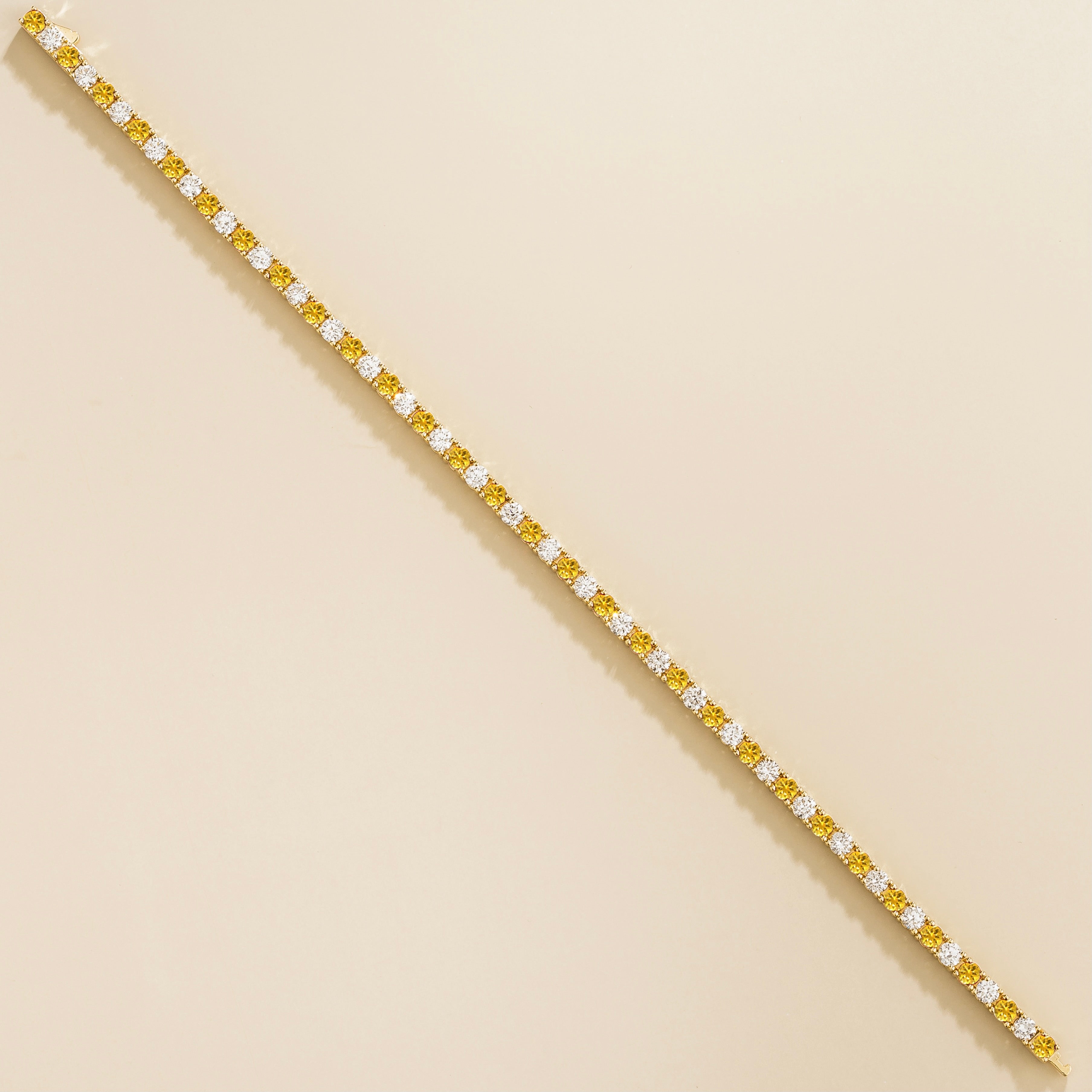 Elegant Gold Tennis Bracelet Featuring Yellow Sapphire & High-Quality Diamond ā Sustainable Luxury