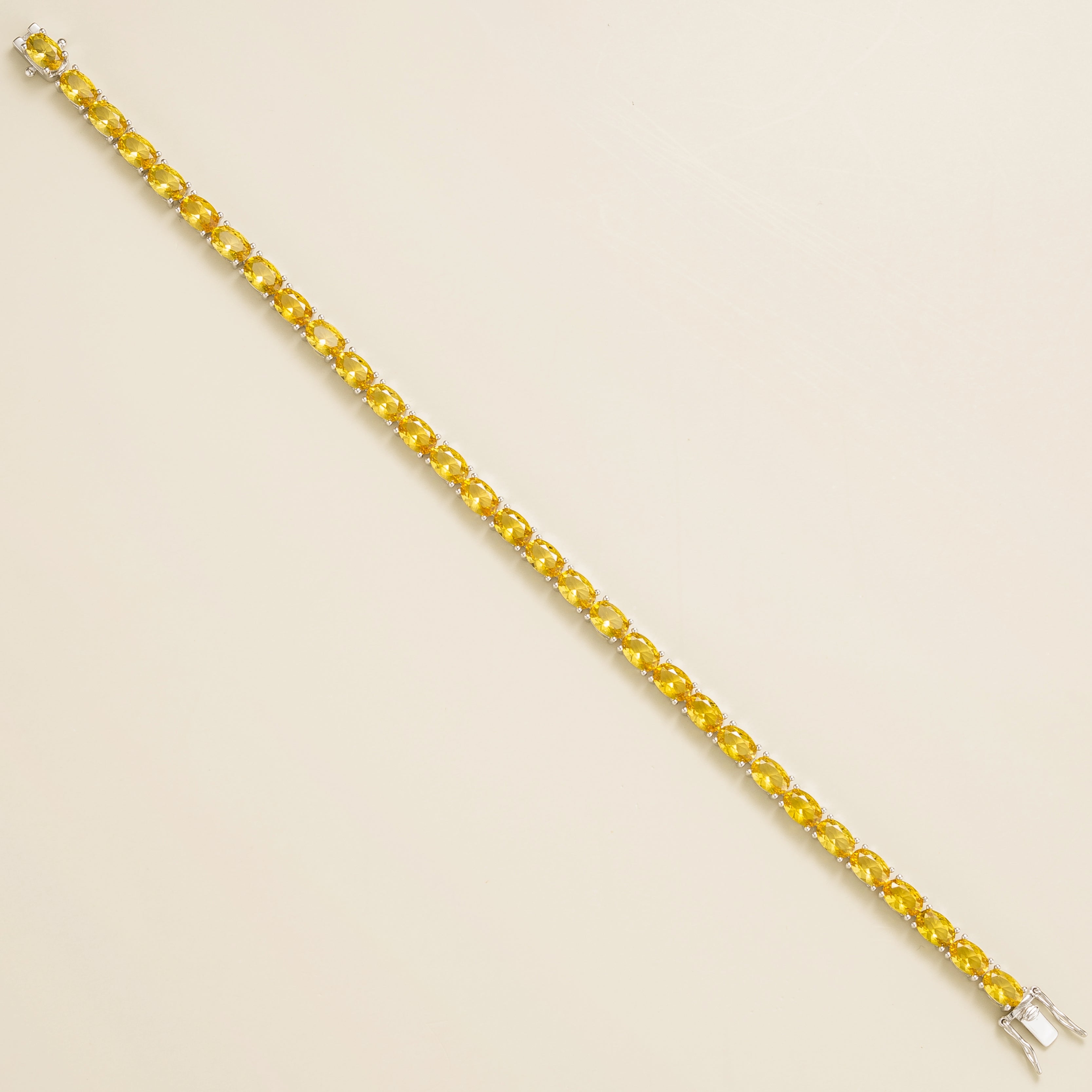 Elegant White Gold Yellow Sapphire Tennis Bracelet – Sustainable Luxury