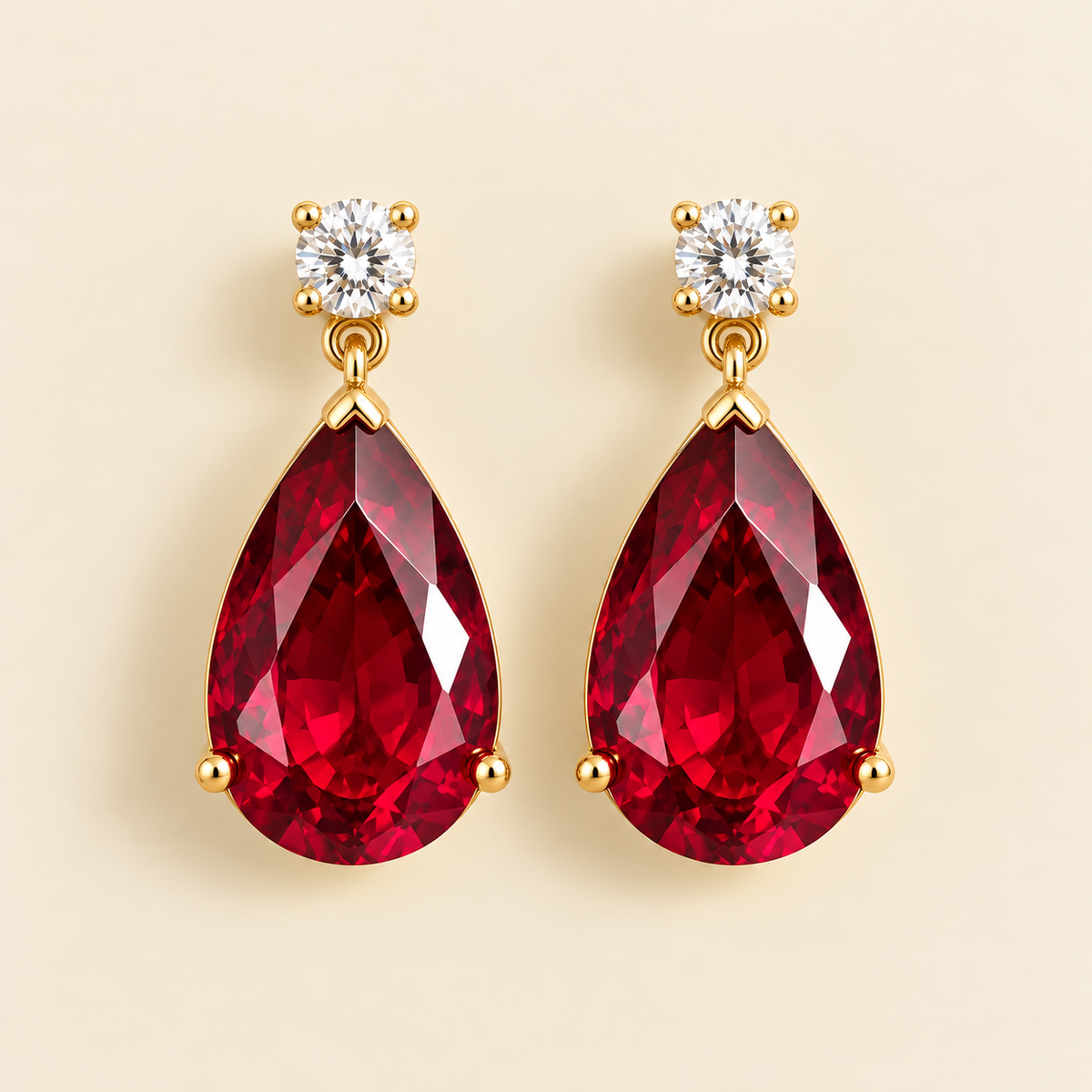 Large lab-grown ruby and diamond pear drop earrings in gold – front view | Pisa by Juvetti