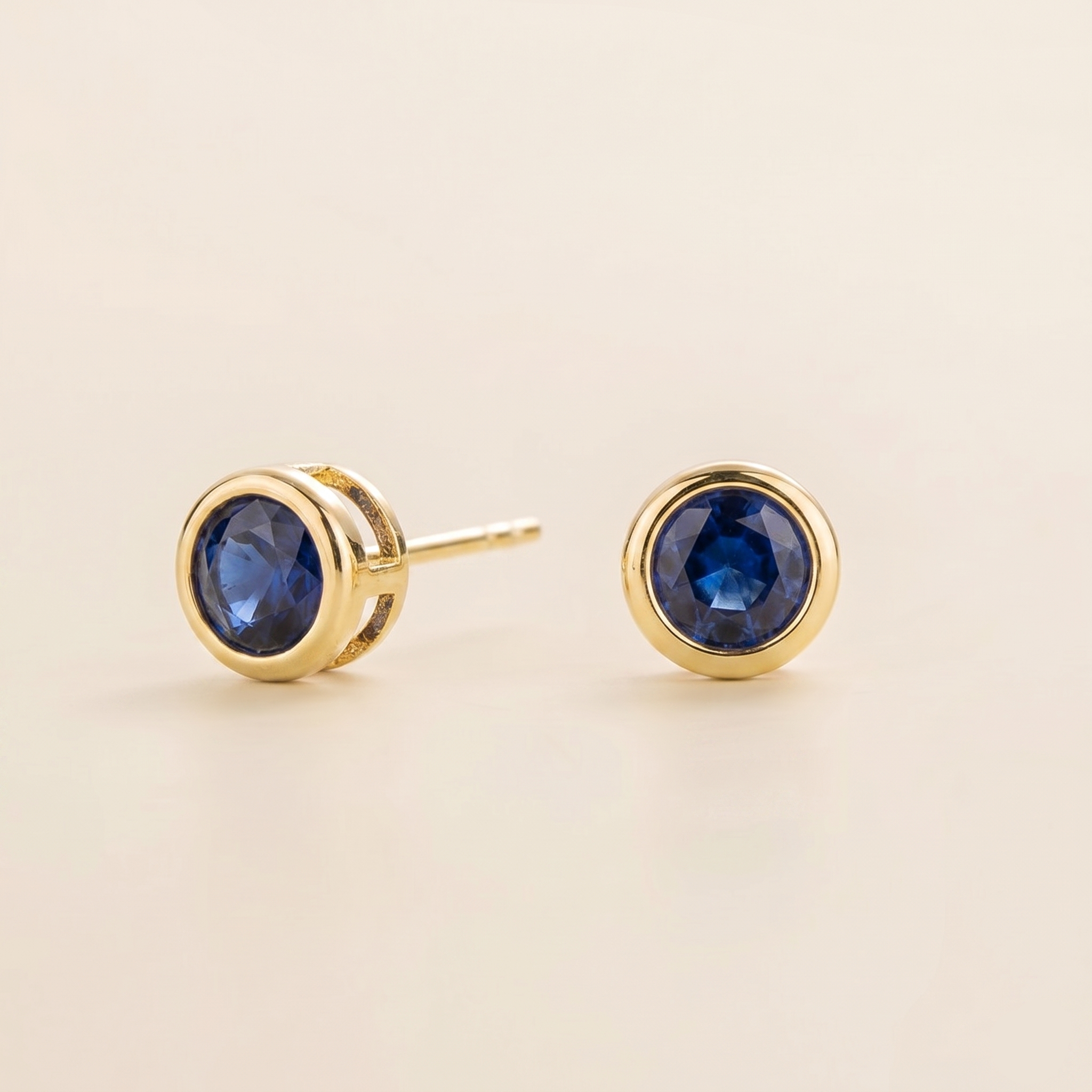 Margo Blue Sapphire Round Bazel Set Gold Earrings