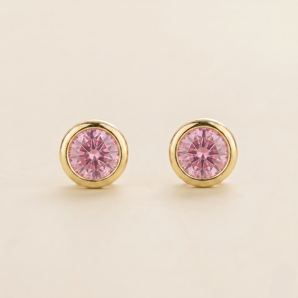 Round bezel-set lab-grown pastel pink sapphire Margo earrings in gold | Juvetti London