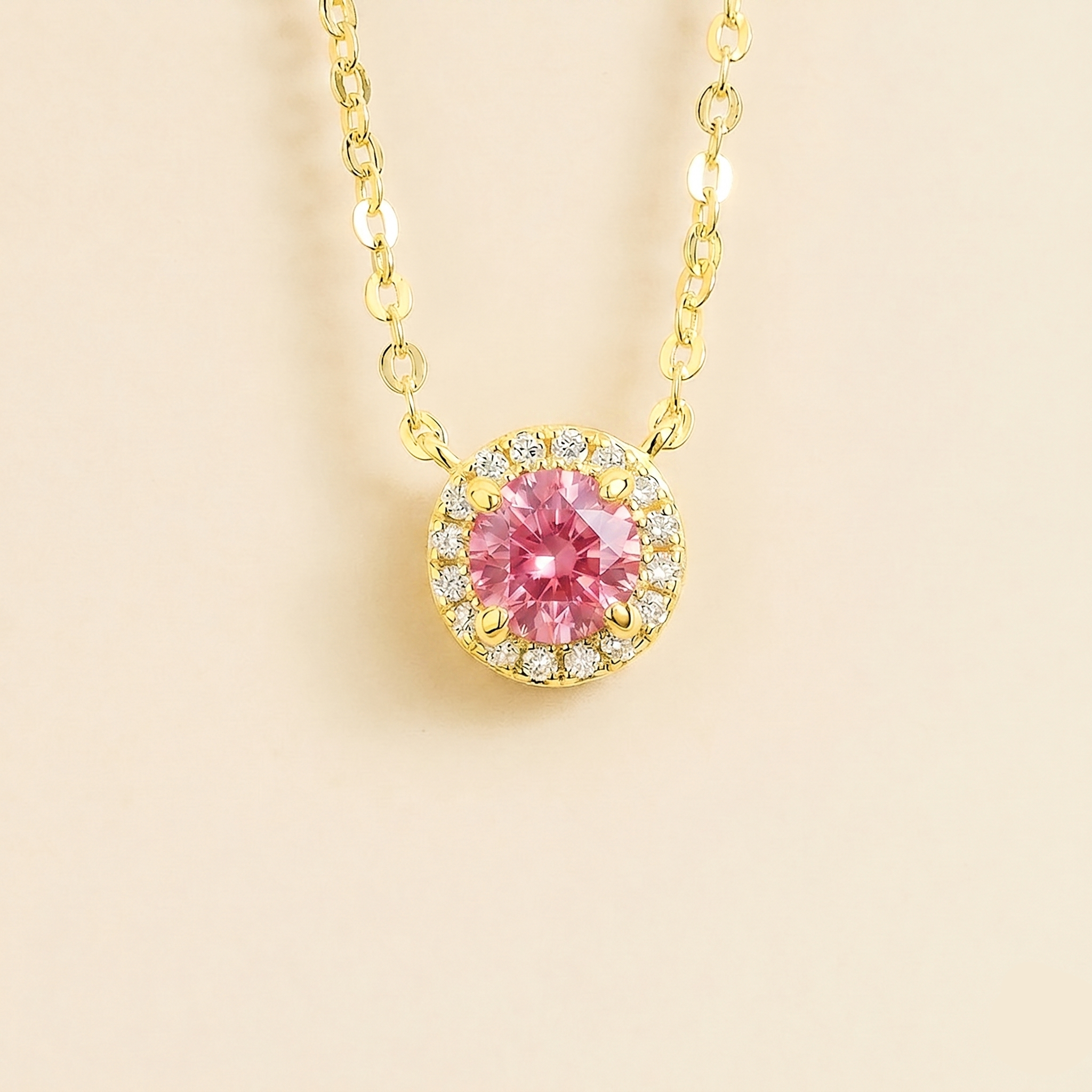 Round lab-grown pastel pink sapphire and diamond halo Mars necklace in gold | Juvetti London