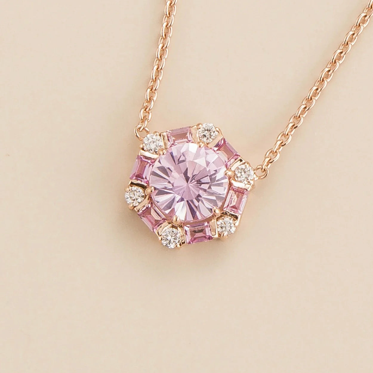 Melba hexagon necklace in 18K pink gold vermeil set with lab grown Pink sapphire and Diamond gem stones.