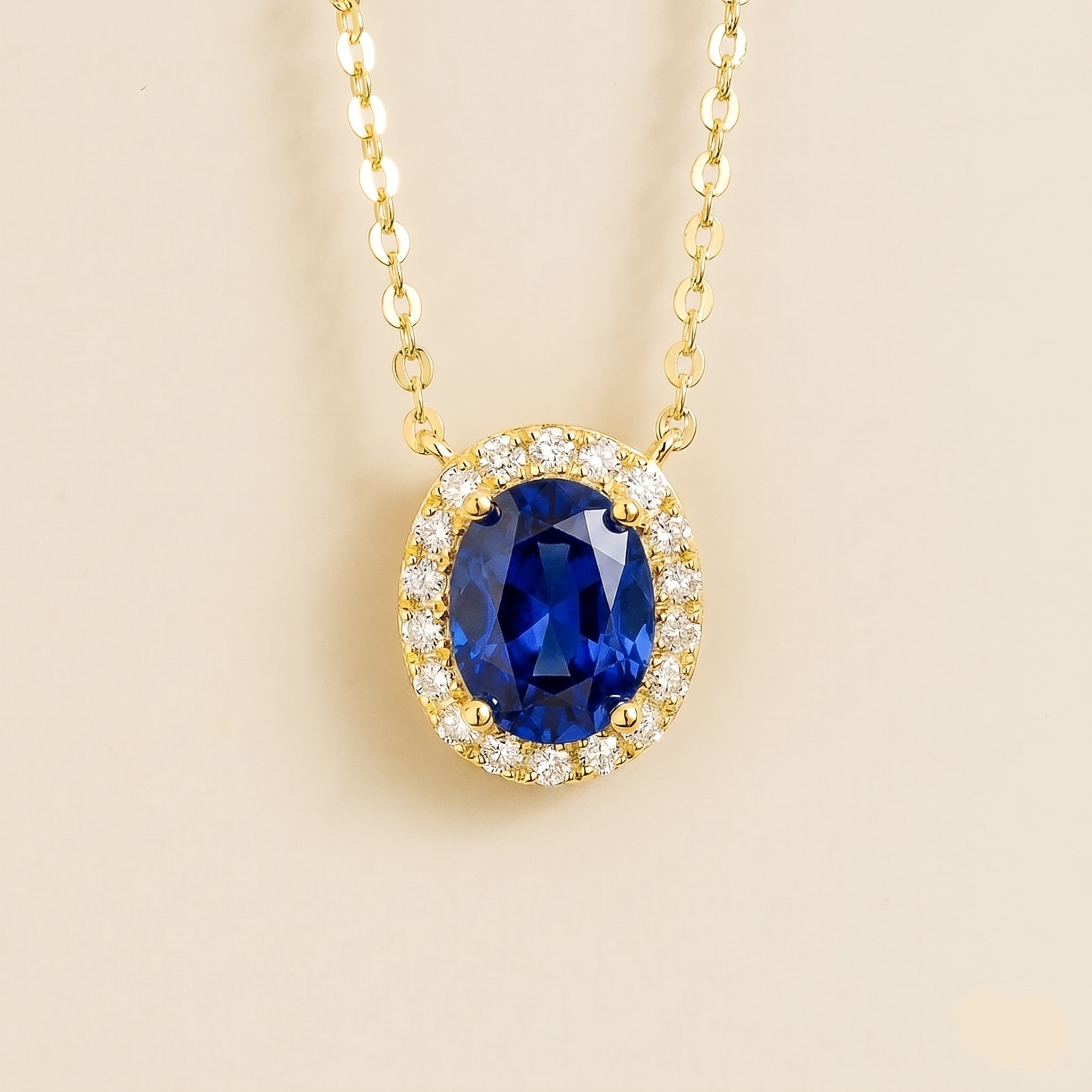 Oval lab-grown blue sapphire and diamond halo Mina necklace in gold | Juvetti London
