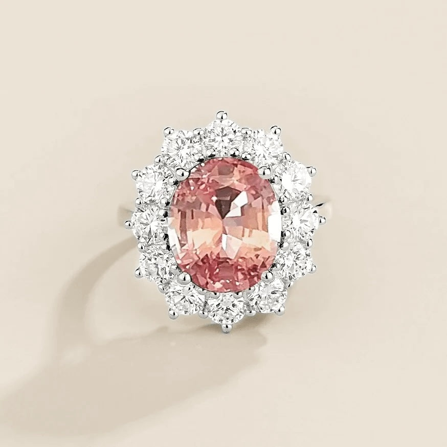 Oda Padparadscha Sapphire Oval & Diamond Halo Ring in White Gold | Juvetti