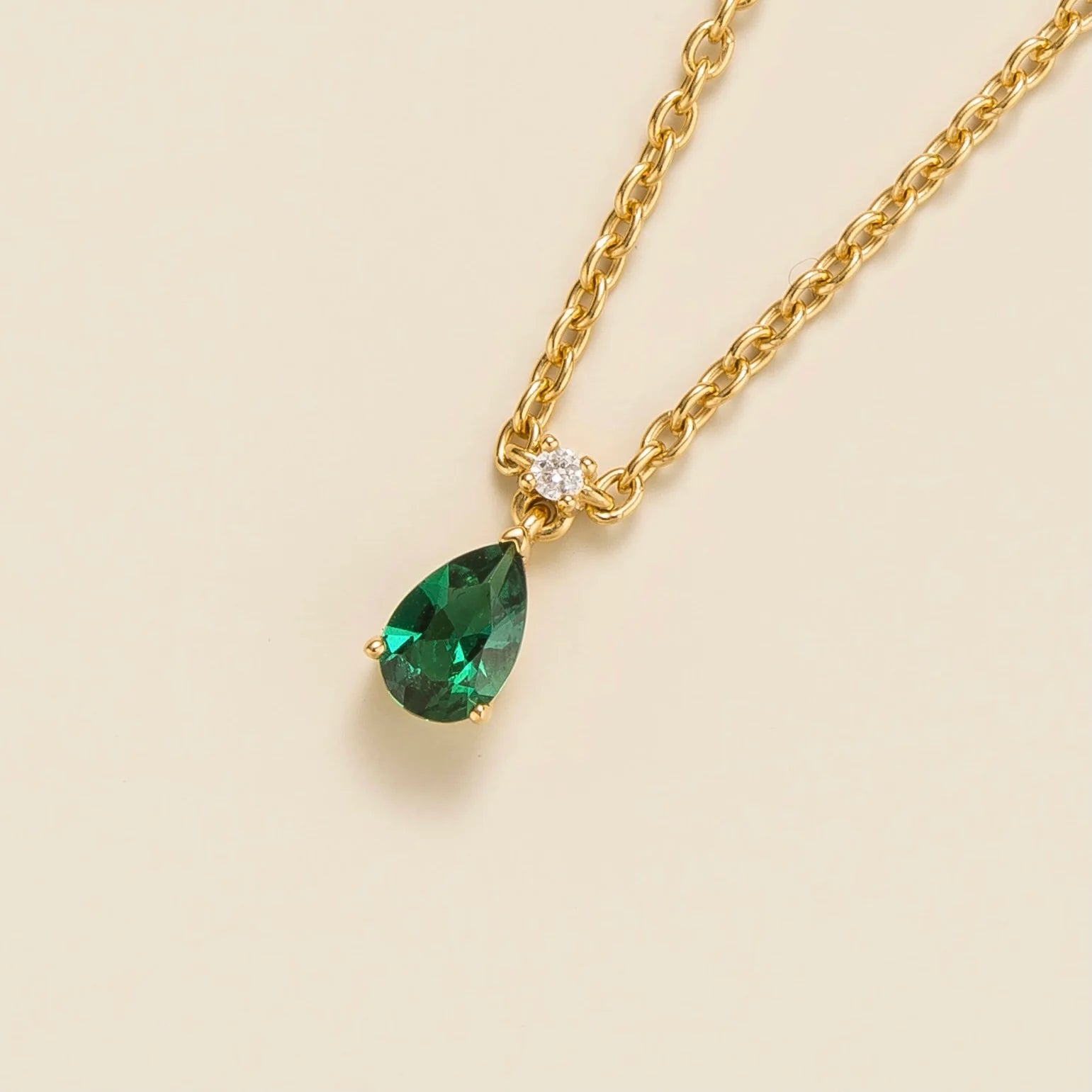 Ori small pendant necklace in Emerald and Diamond set in Gold Best London Jewellery Store