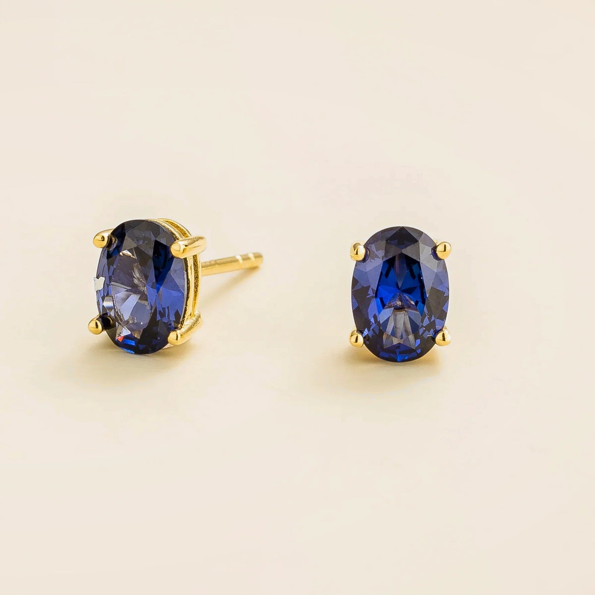 Ova Blue Sapphire Earrings in Gold – front view
