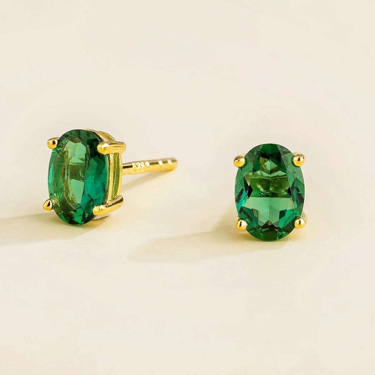 Ova Emerald Earrings in Gold – front view