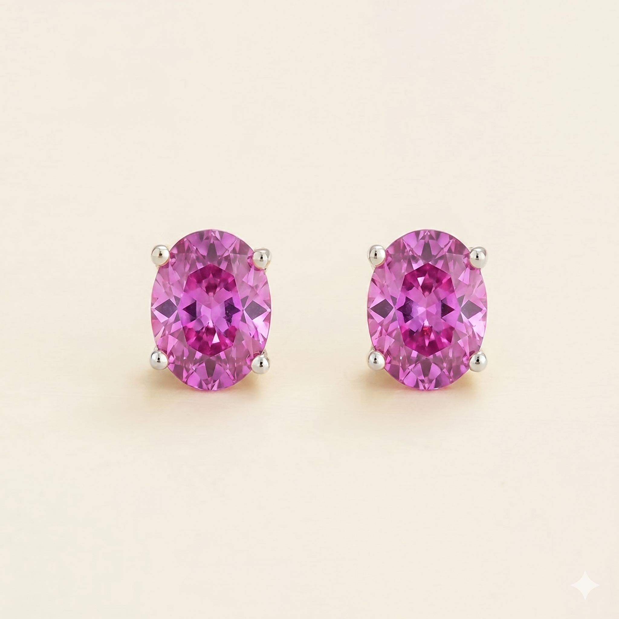 Ovo Vivid Pink Sapphire Oval Stud Earrings in White Gold
