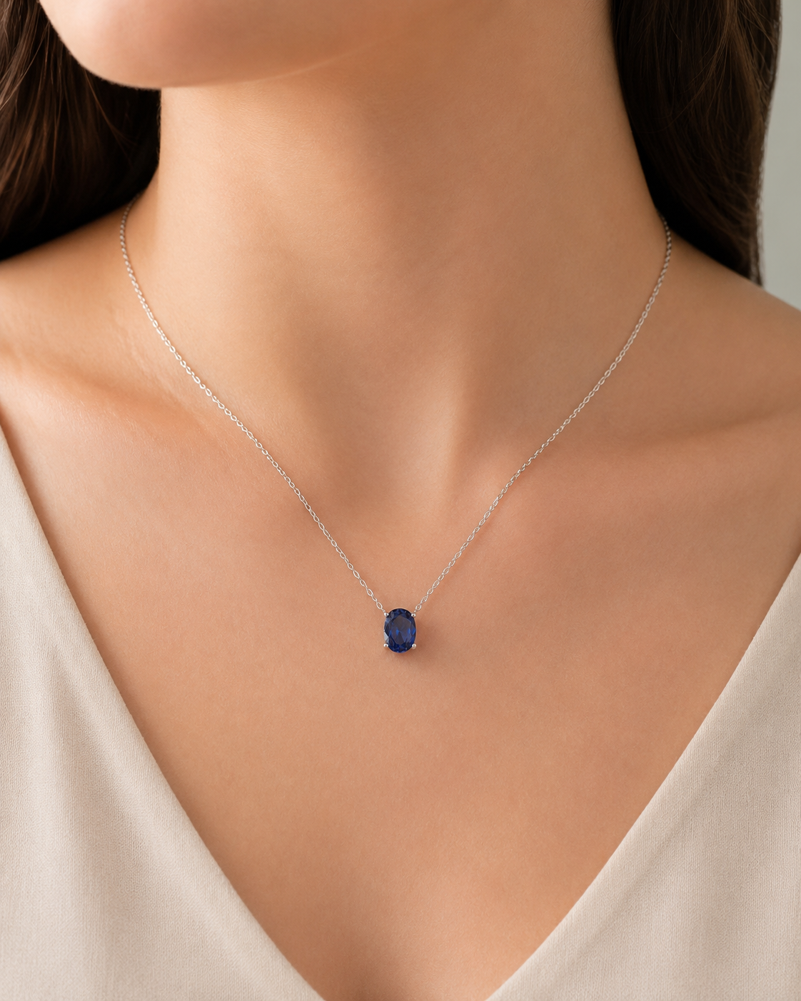 Ovo Blue Sapphire Oval Solitaire Pendant Necklace in White Gold