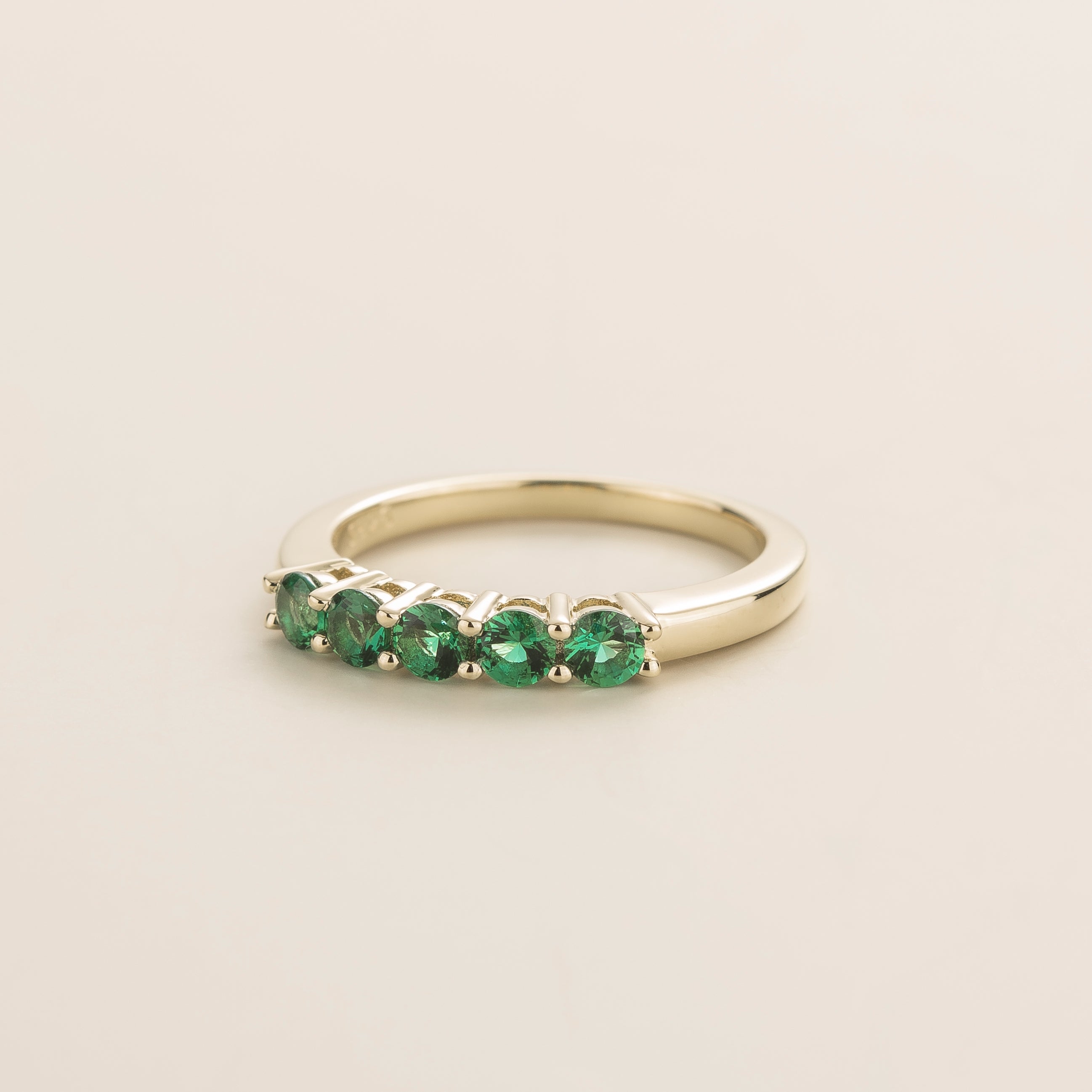 Paro White Gold Ring Set With Emerald by Juvetti from London
