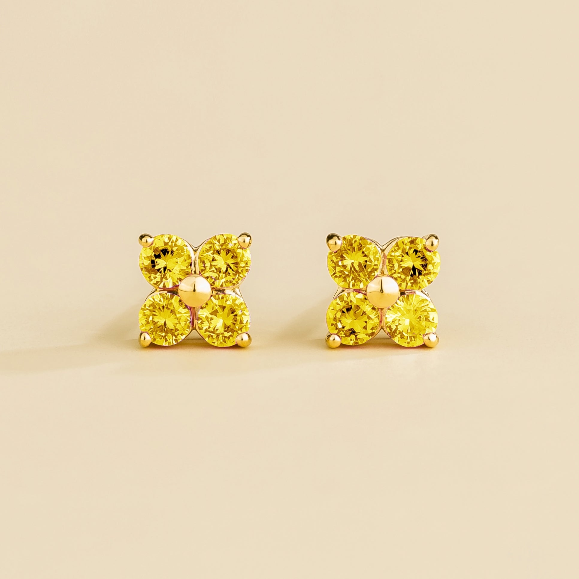Elegant Gold Earrings Featuring Round Yellow Sapphire Gemstones – Sustainable Luxury