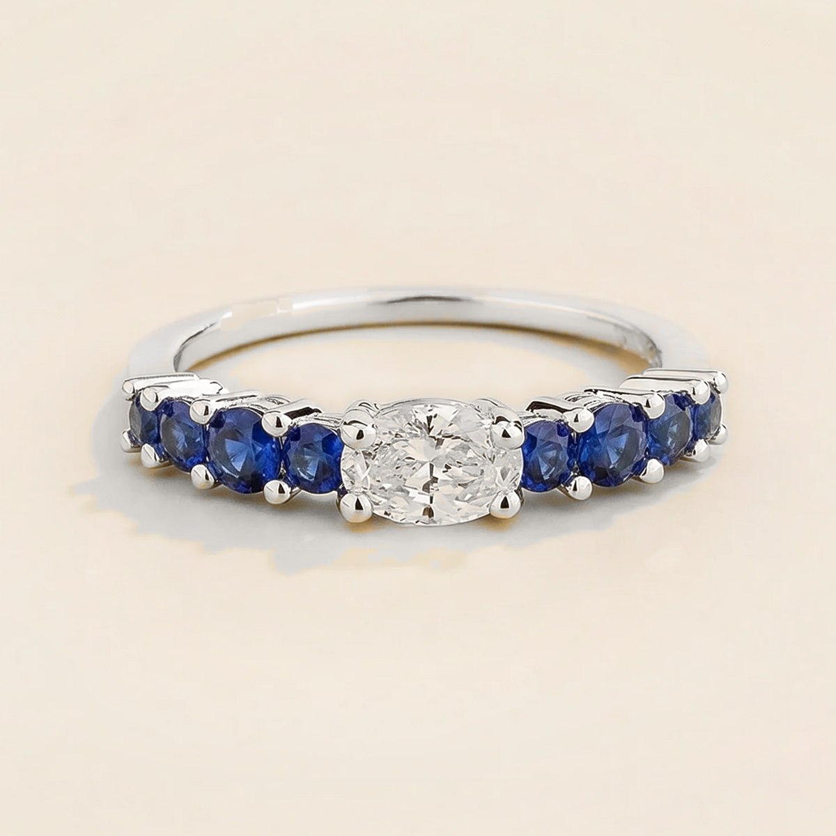 Petra Oval Diamond & Blue Sapphire Half Eternity Ring in White Gold | Juvetti