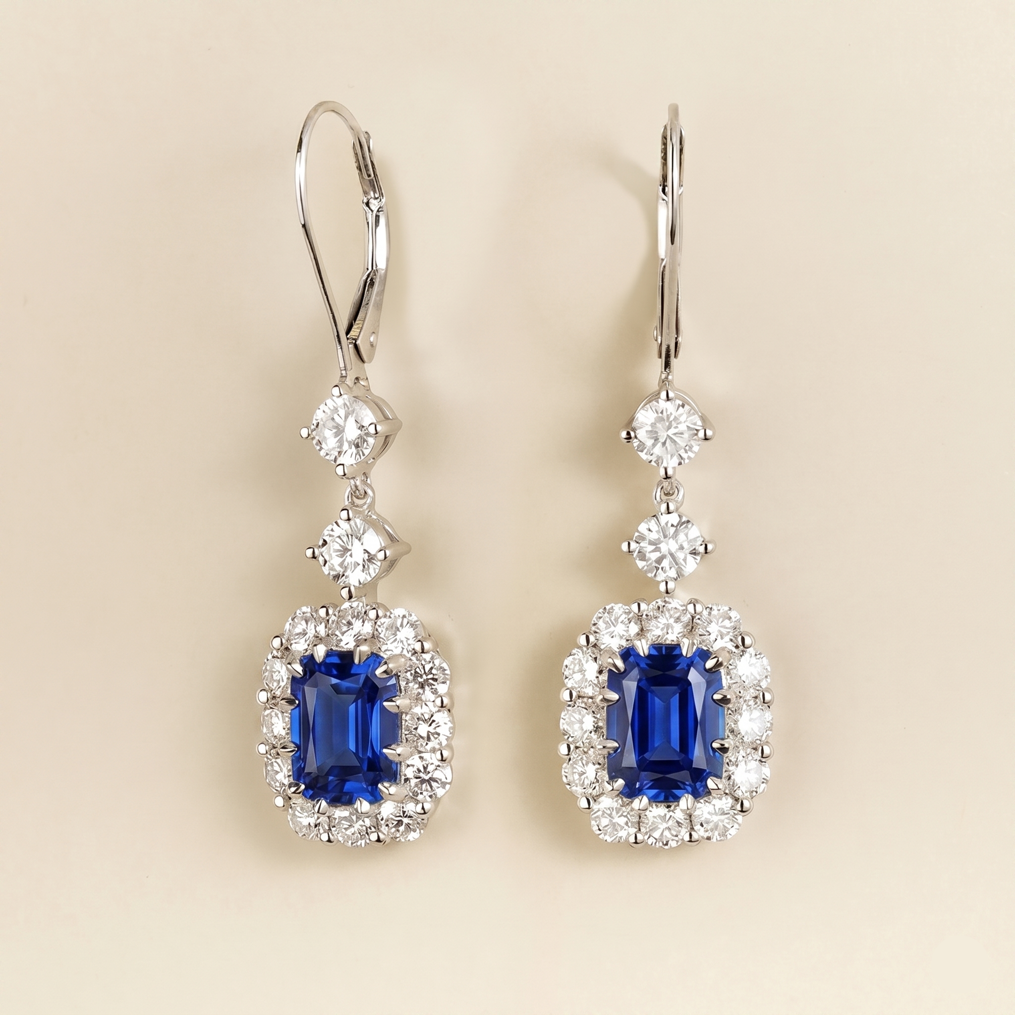 Pippa Emerald Cut Blue Sapphire & Diamond Halo Dangle Drop Earrings in White Gold