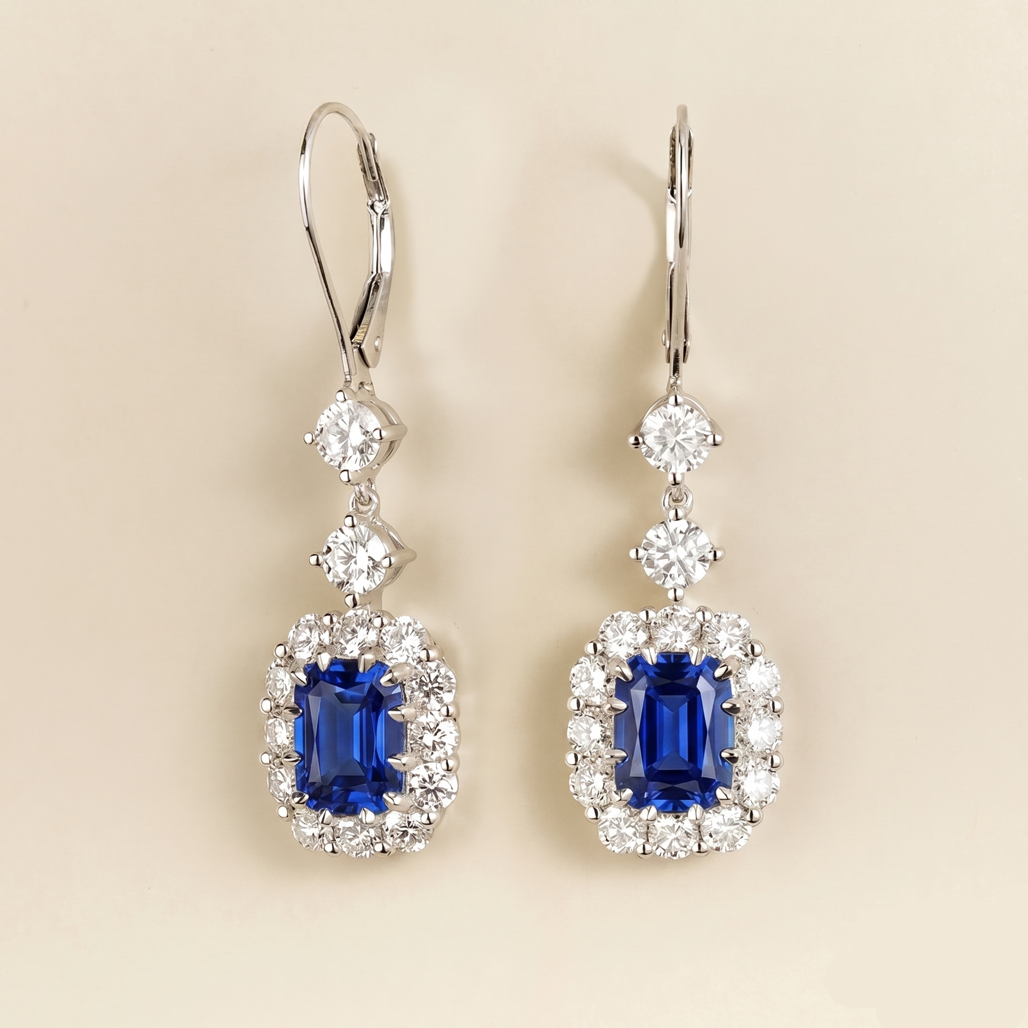 Pippa Emerald Cut Blue Sapphire & Diamond Halo Dangle Drop Earrings in White Gold