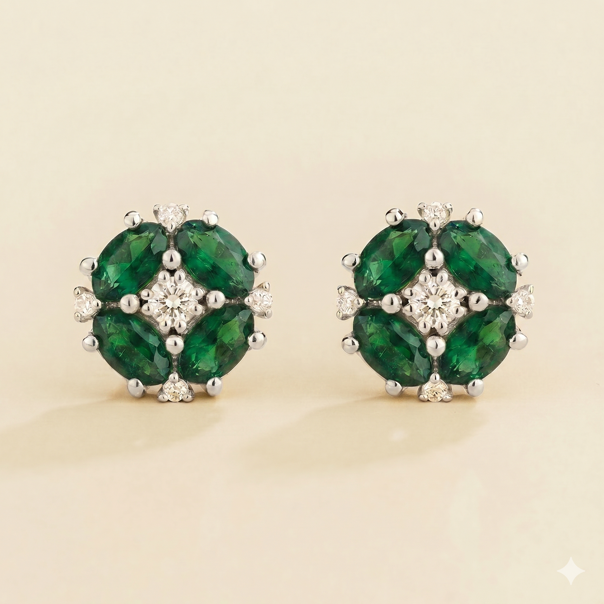 Pristi Oval Emerald & Diamond Cluster Earrings in White Gold