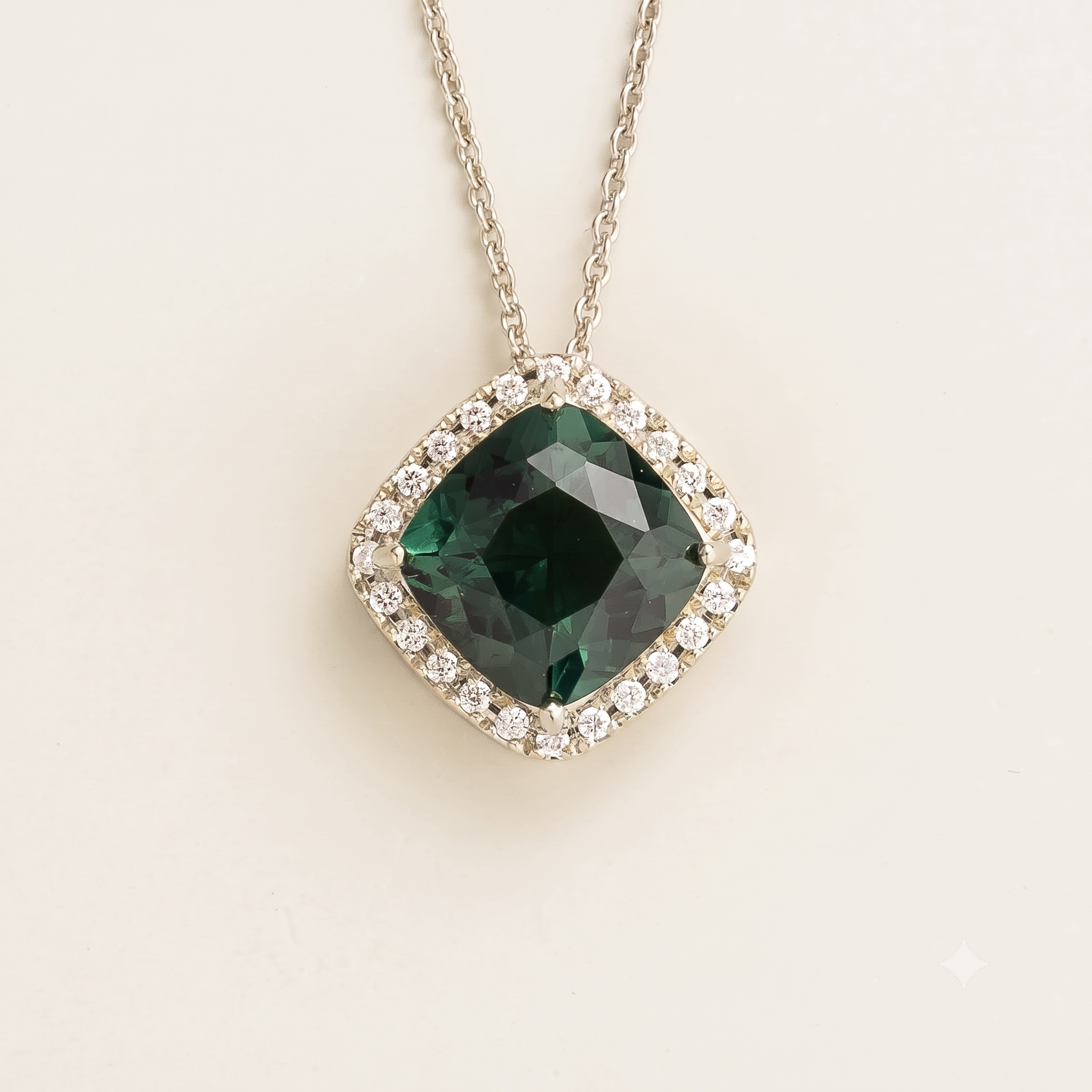 Cushion-cut lab-grown emerald and diamond halo Pude necklace in white gold | Juvetti London