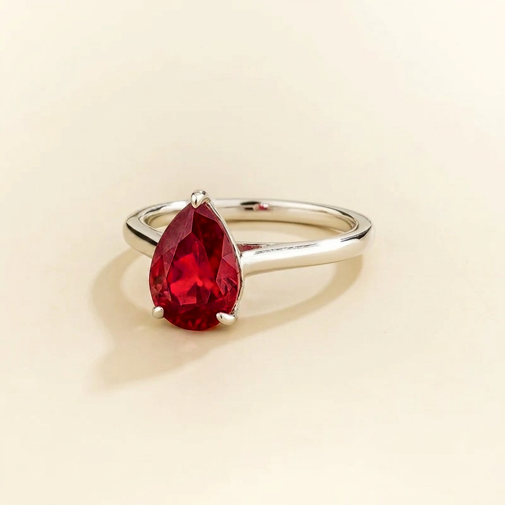 Pandal Pear Shape Ruby Cathedral Solitaire Ring in white gold