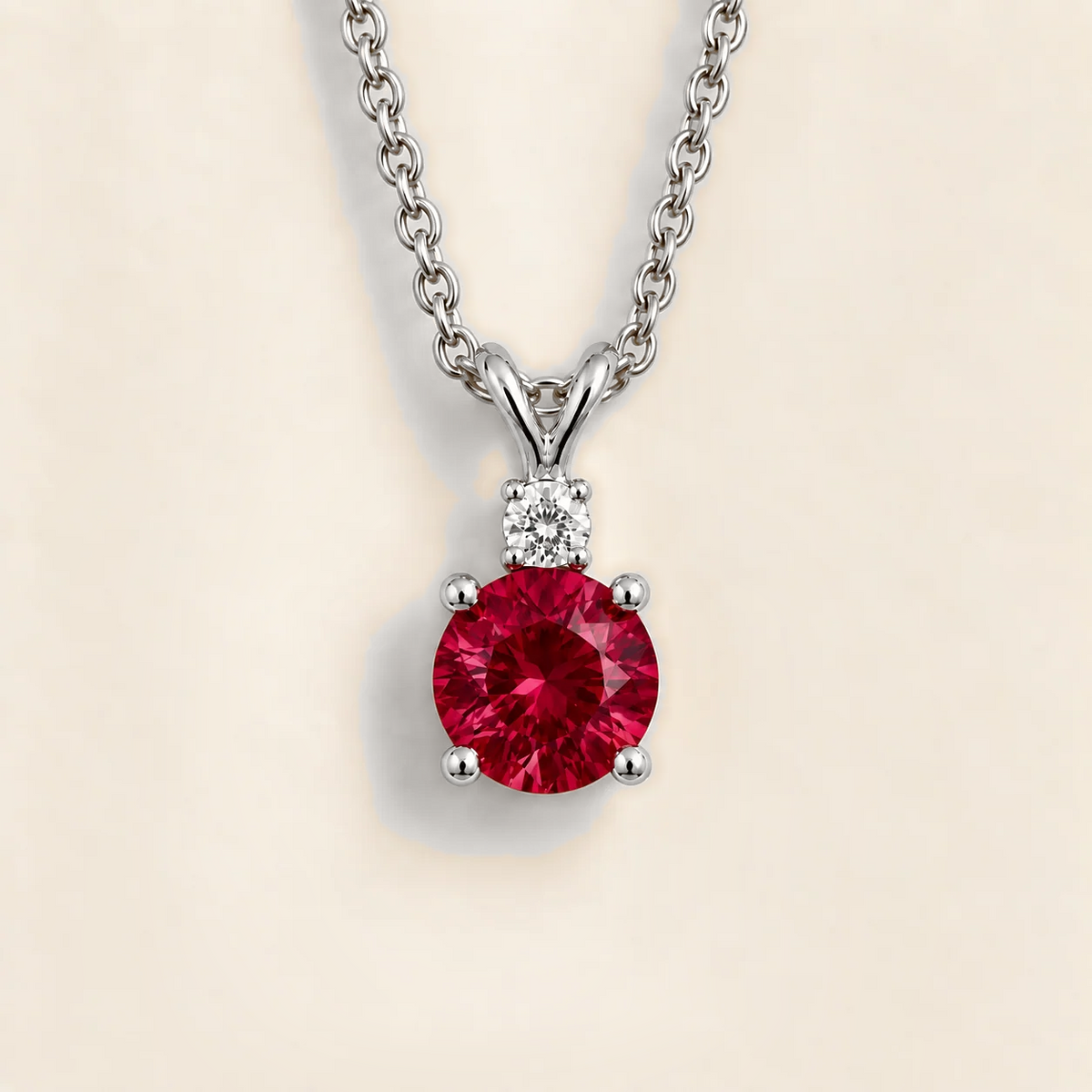 Joie Round Ruby & Diamond Drop Pendant Necklace In White Gold by Juvetti, bespoke jewellery London