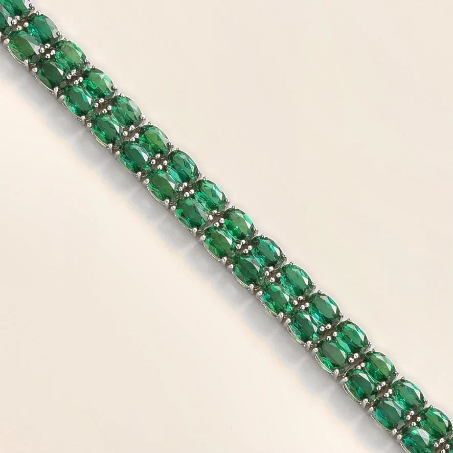 Oval Emerald Double Row Tennis Bracelet in White Gold – close-up of the setting