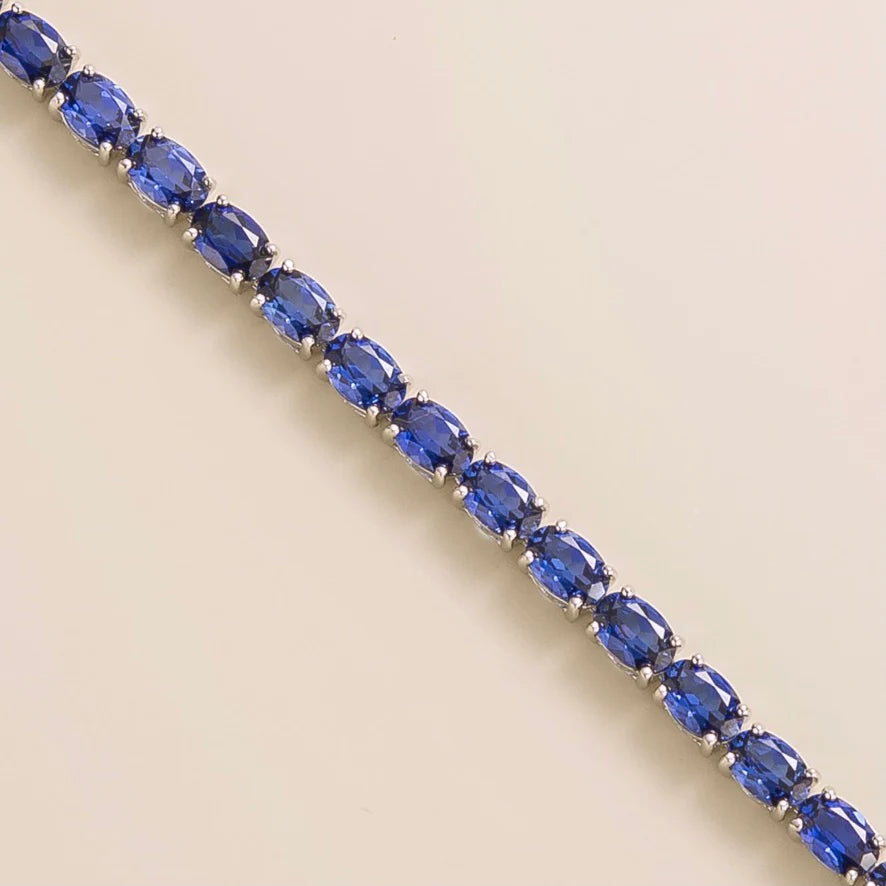 Salto White Gold Tennis Bracelet Set With Blue Sapphire By Juvetti London UK