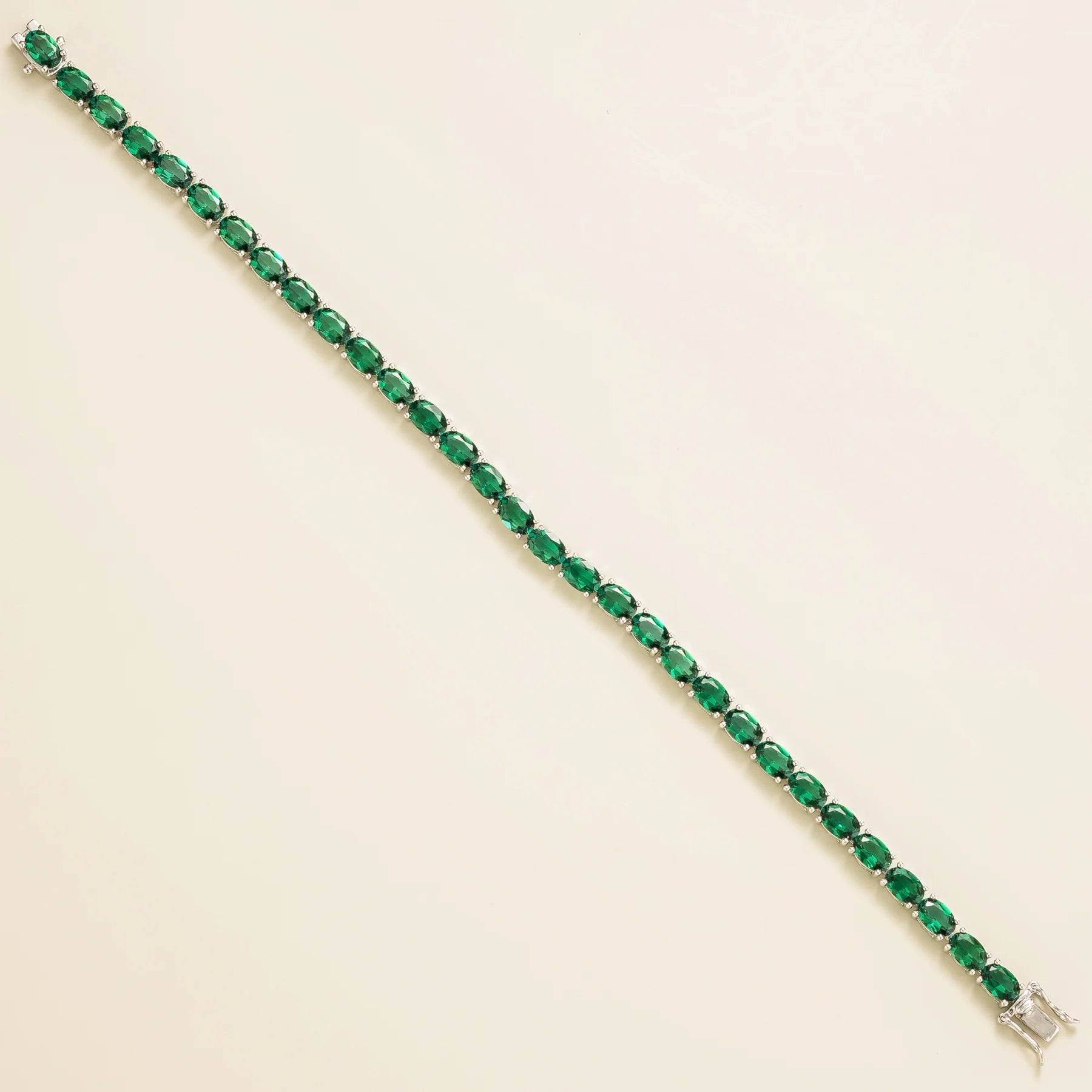 Salto White Gold Tennis Bracelet Set With Emerald Best London Jewellery UK