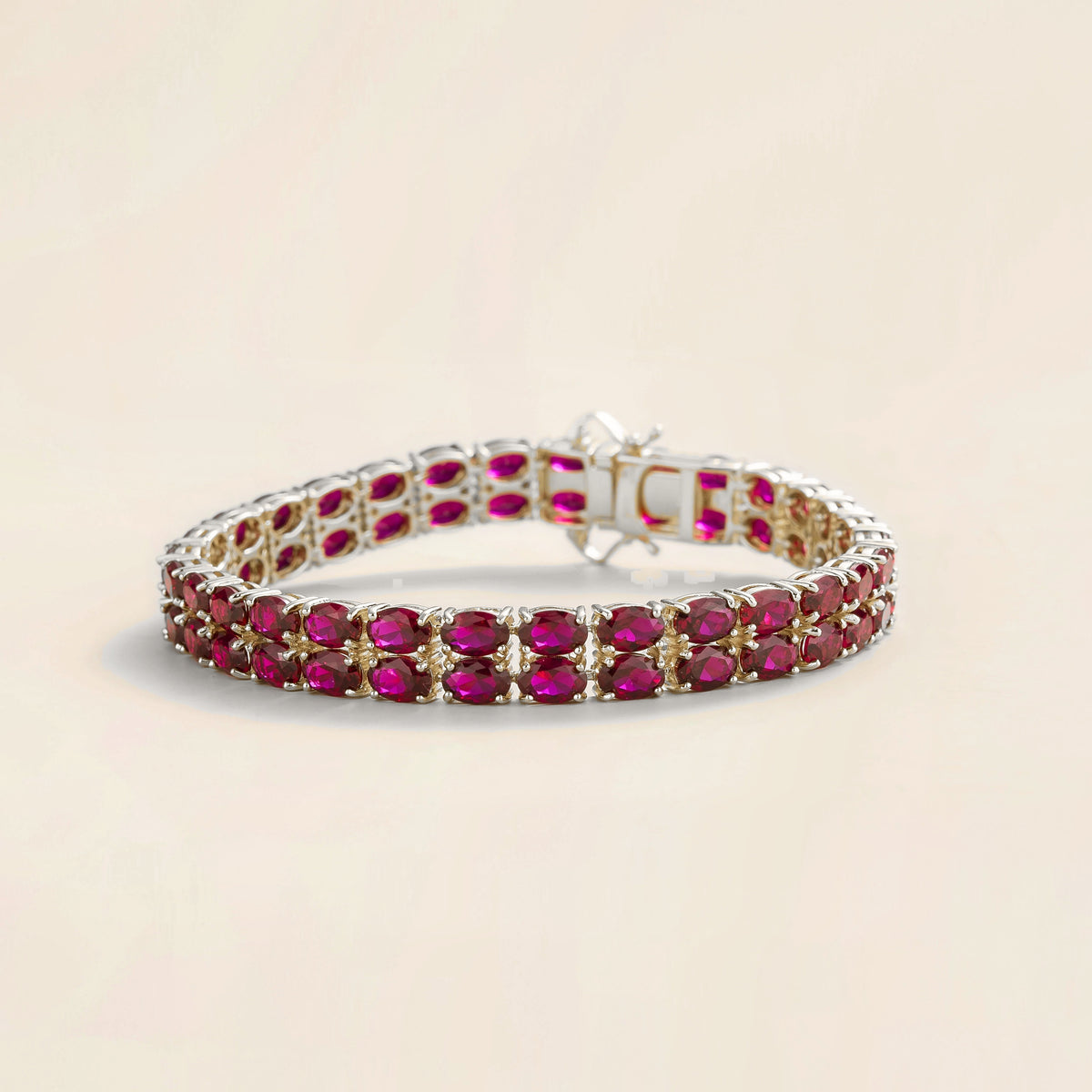 Oval lab-grown ruby double-row tennis bracelet in white gold | Juvetti London