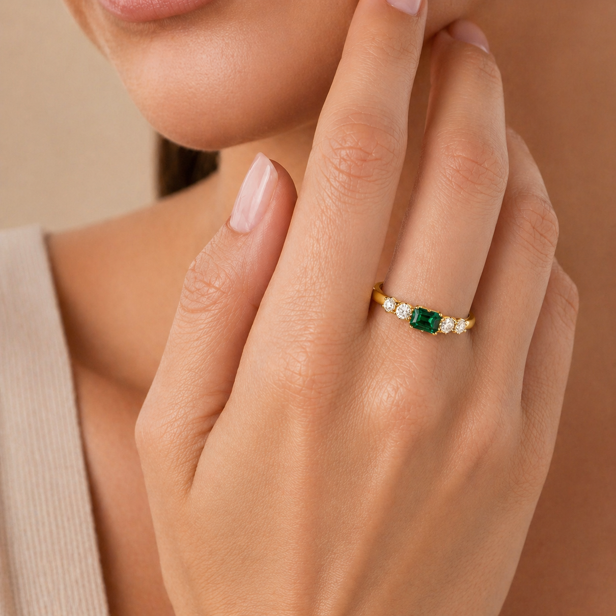 Savis East-West Emerald Cut Emerald Ring with Four Side Diamonds in Yellow Gold
