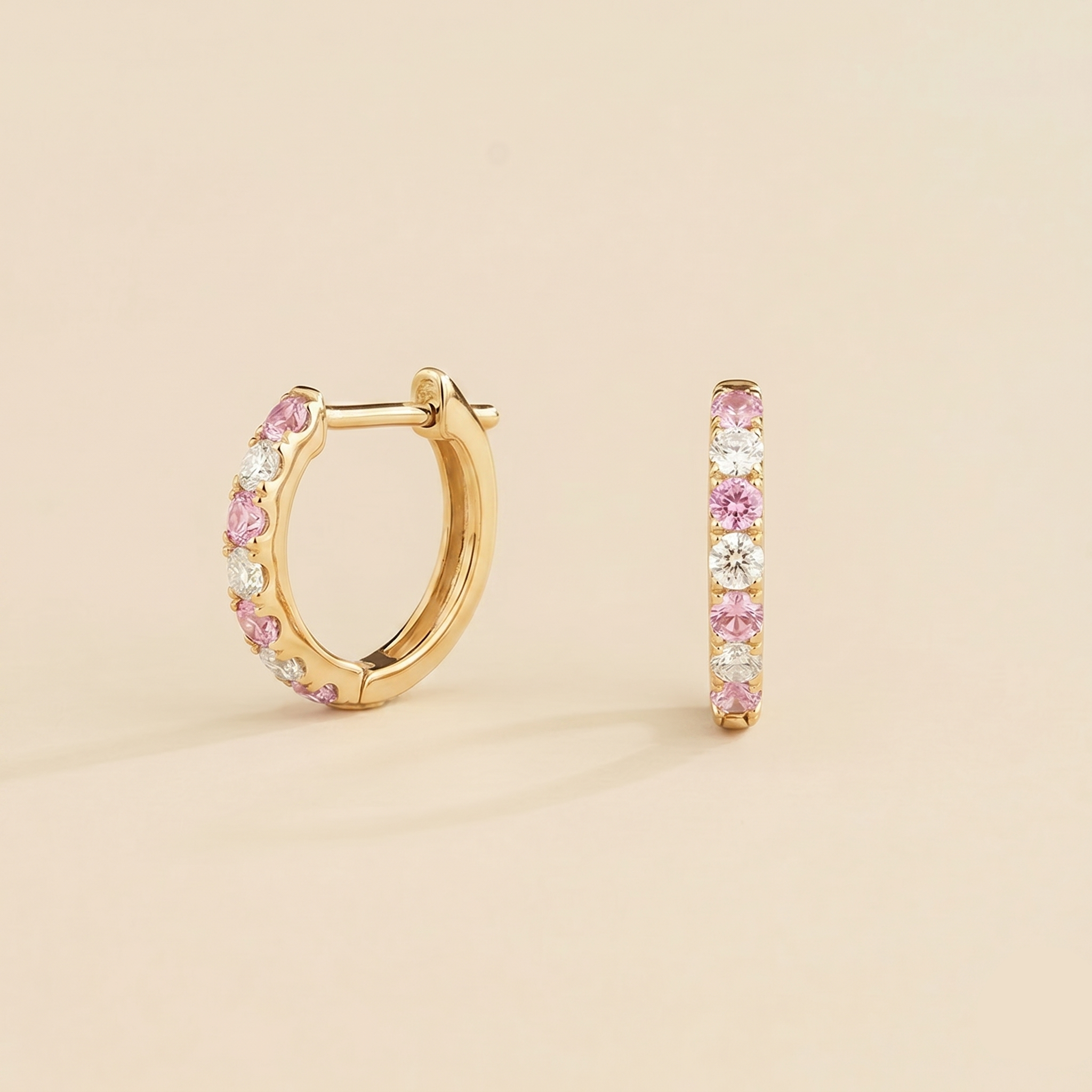 Lab-grown pastel pink sapphire and diamond huggie hoop earrings, Stacy design in gold | Juvetti London