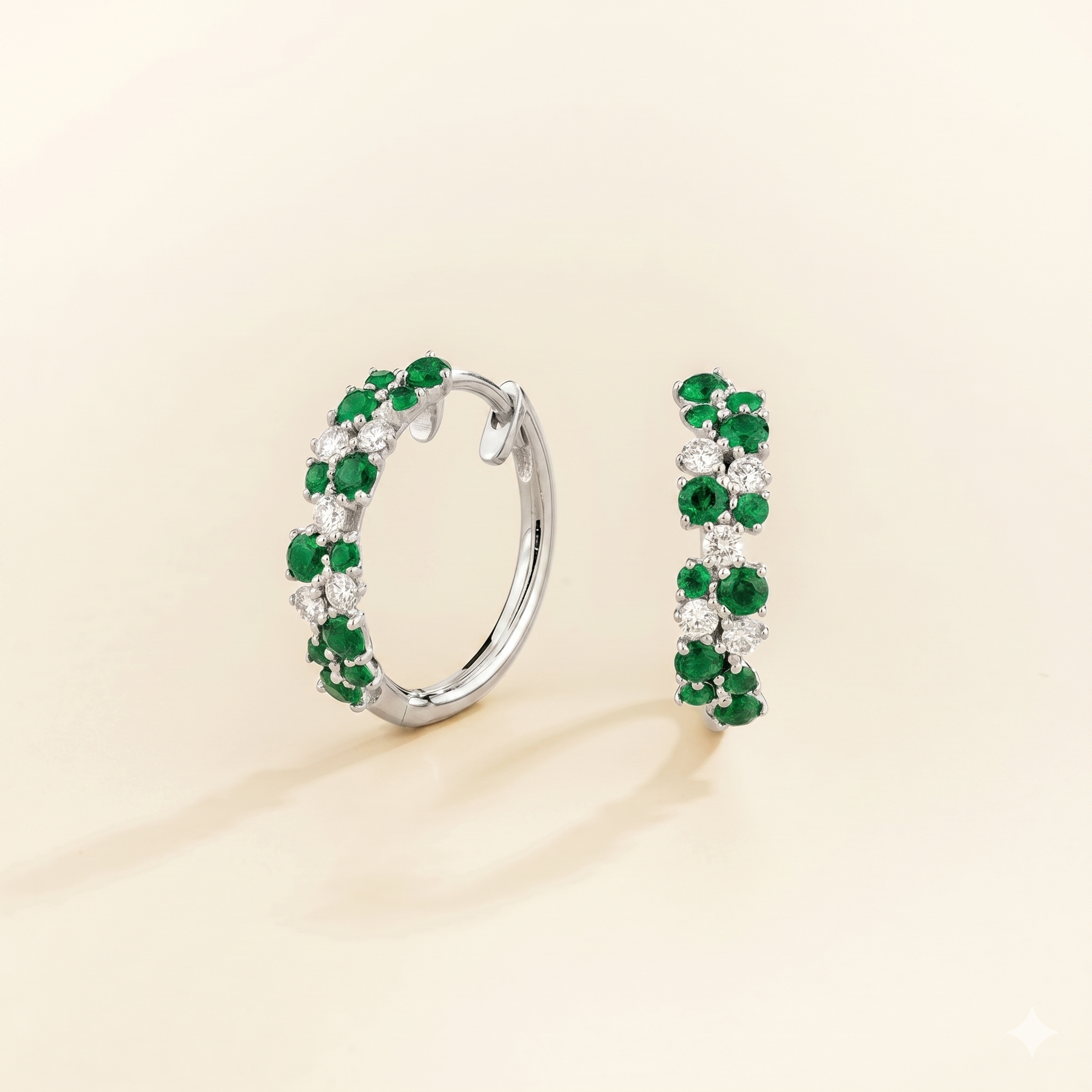 Starry Emerald & Diamond Cluster Huggie Hoop Earrings in White Gold