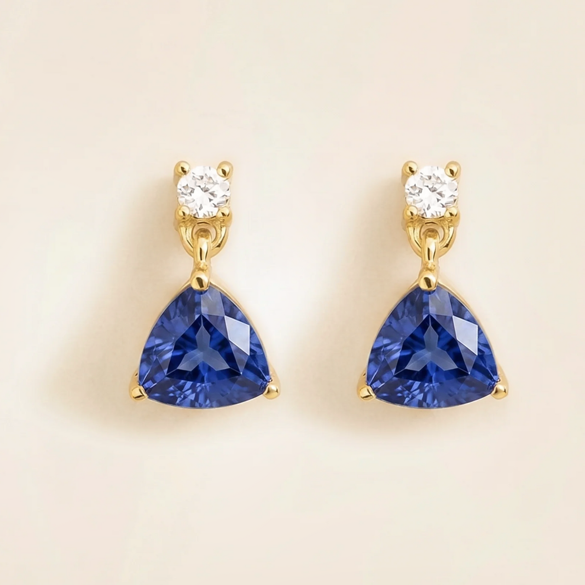 Trillion-cut lab-grown blue sapphire and diamond drop earrings in gold | Juvetti London