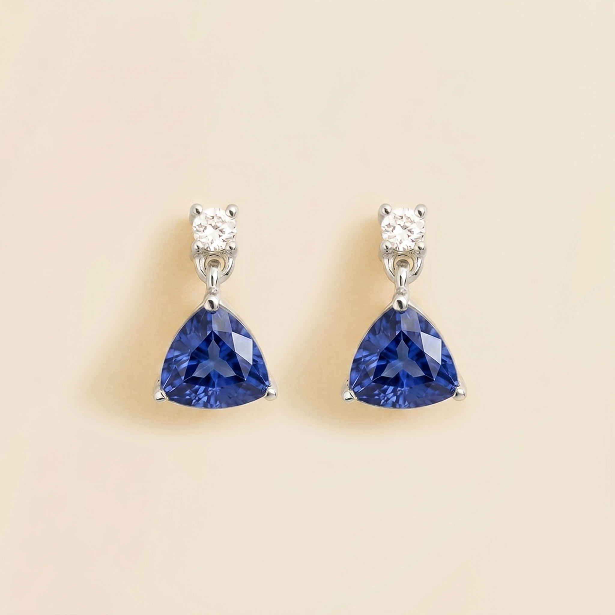 Trillion-cut lab-grown blue sapphire and diamond drop earrings in white gold | Juvetti London