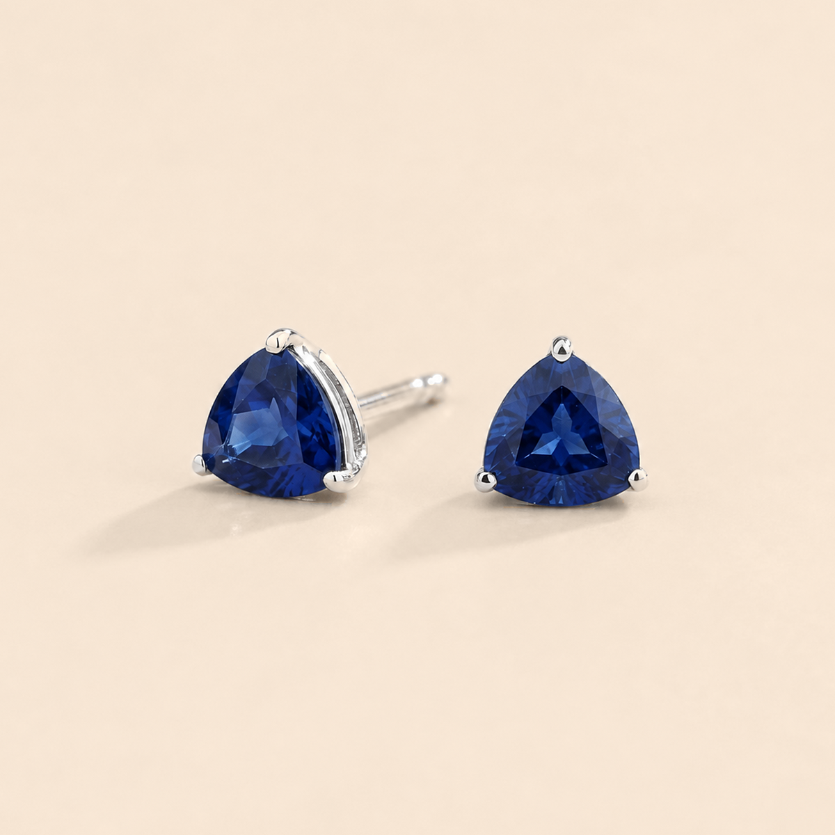 Trillion Blue Sapphire Solitaire Stud Earrings in White Gold