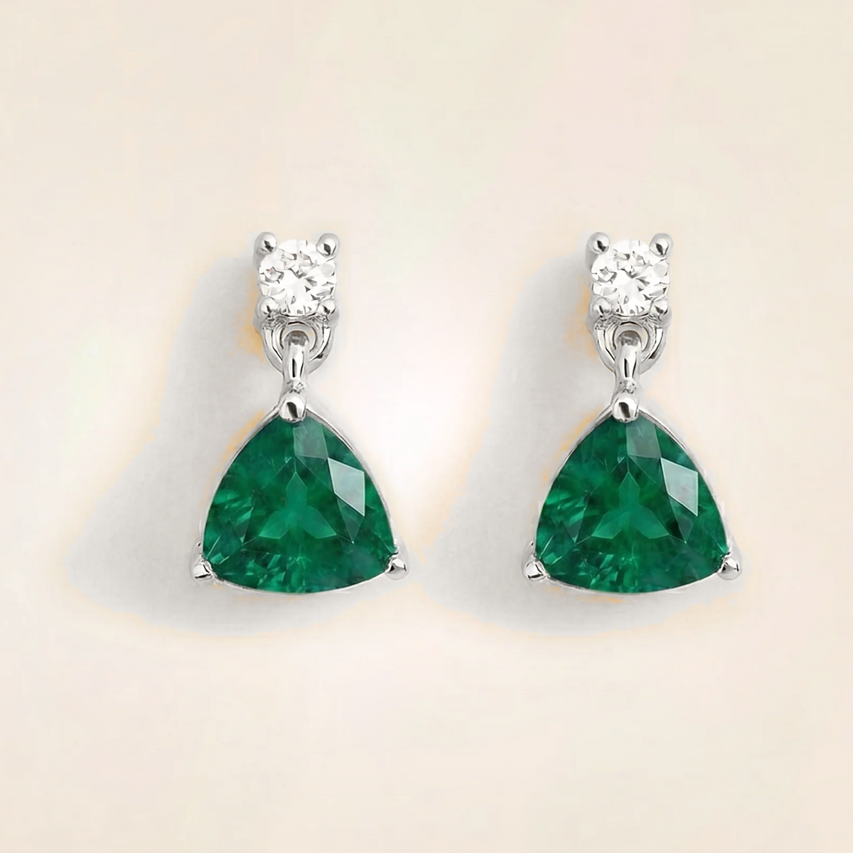 Trillion-cut lab-grown emerald and diamond drop earrings in white gold | Juvetti London