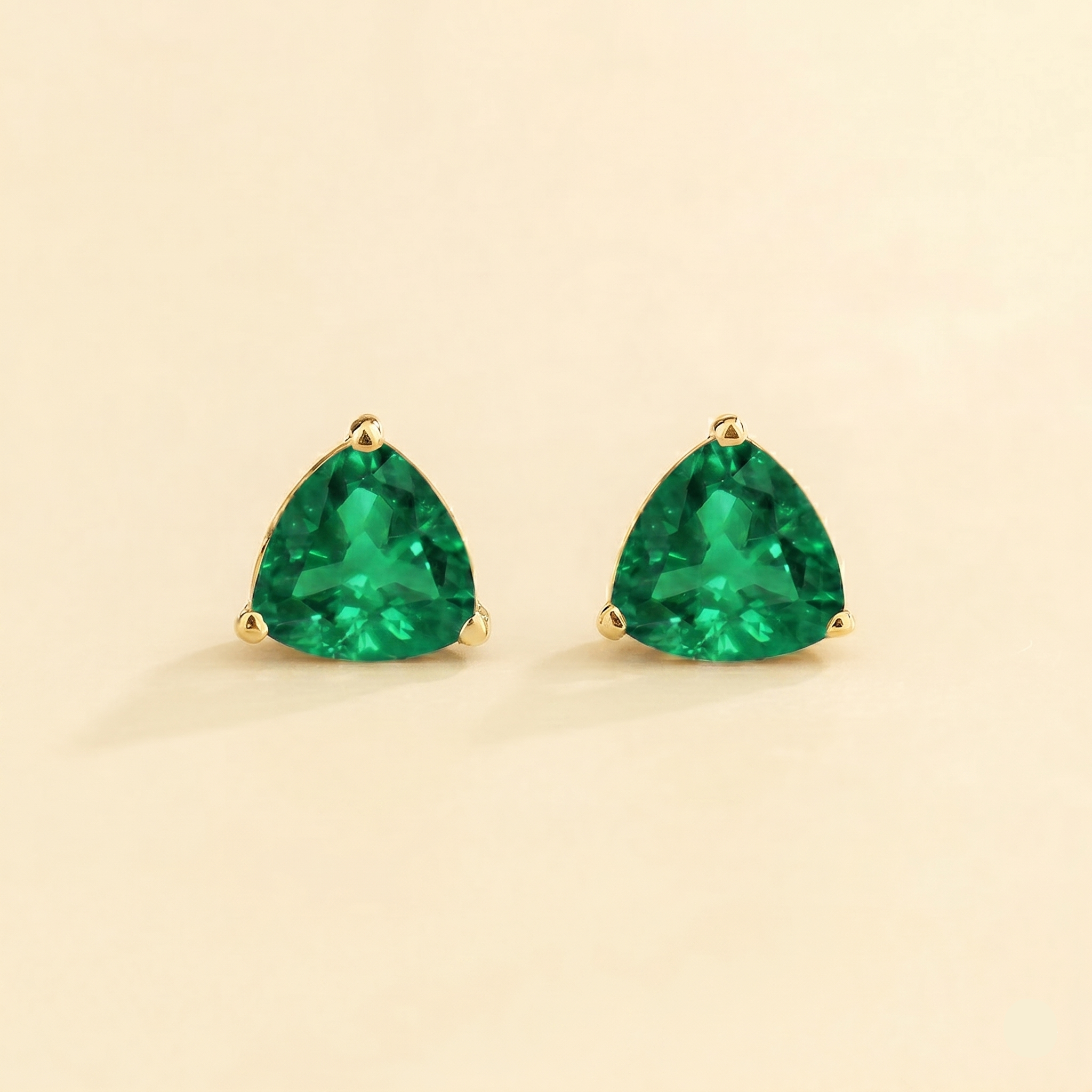 Trillion Emerald Solitaire Stud Earrings in Gold