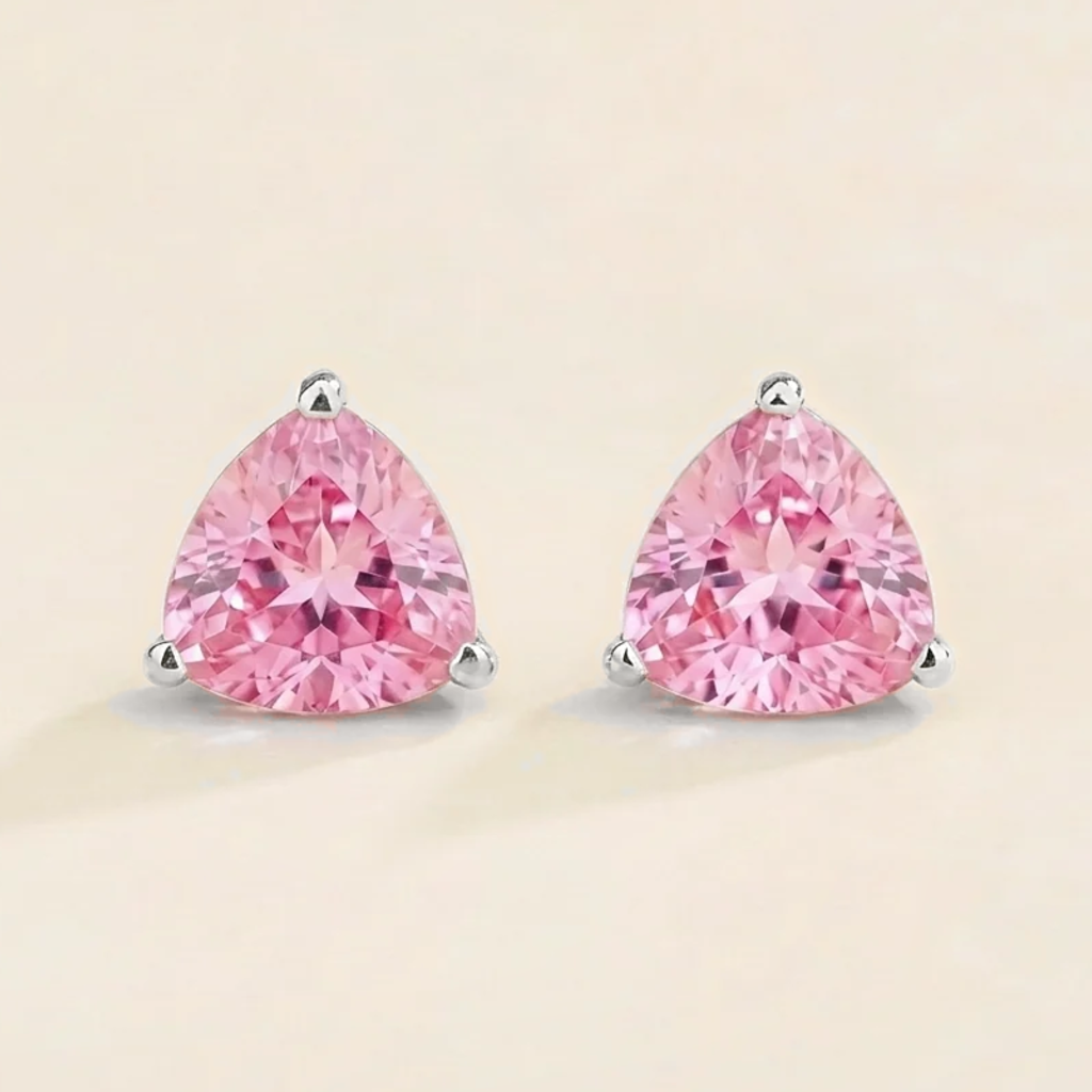 Trillion-cut lab-grown pink sapphire solitaire stud earrings in white gold | Juvetti London