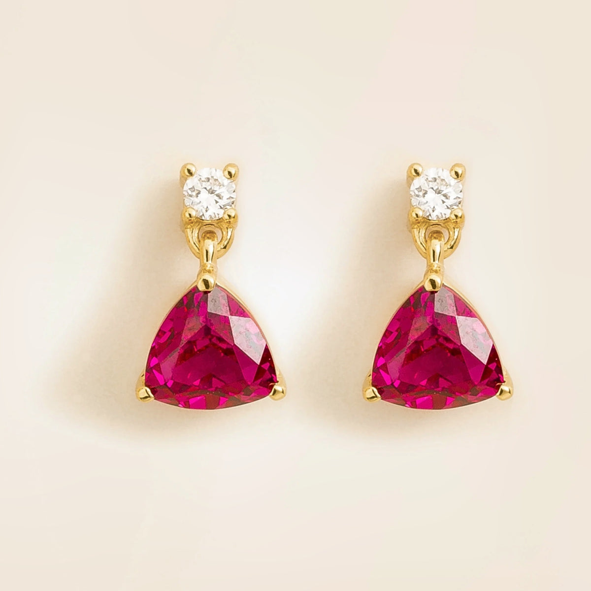Trillion-cut lab-grown ruby and diamond drop earrings in gold | Juvetti London