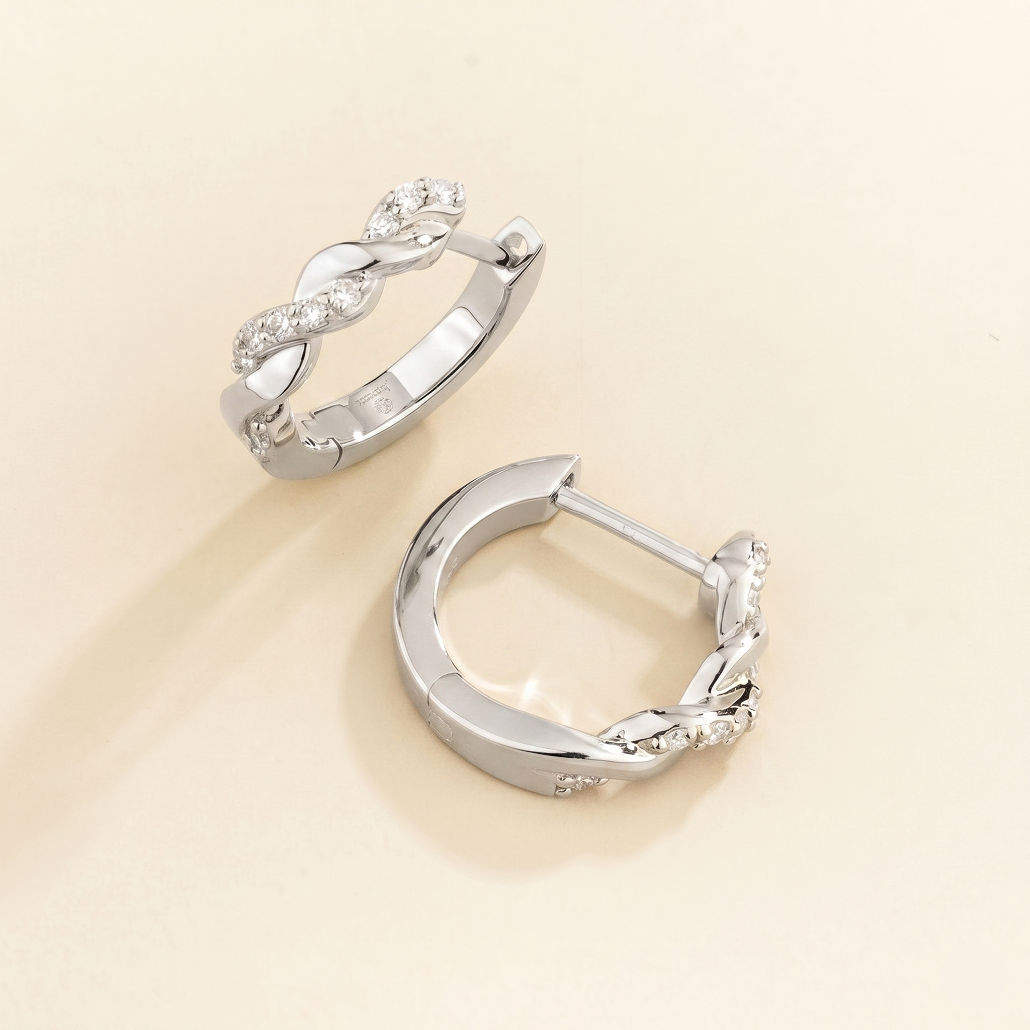 Twist Diamond Huggie Hoop Earrings in White Gold